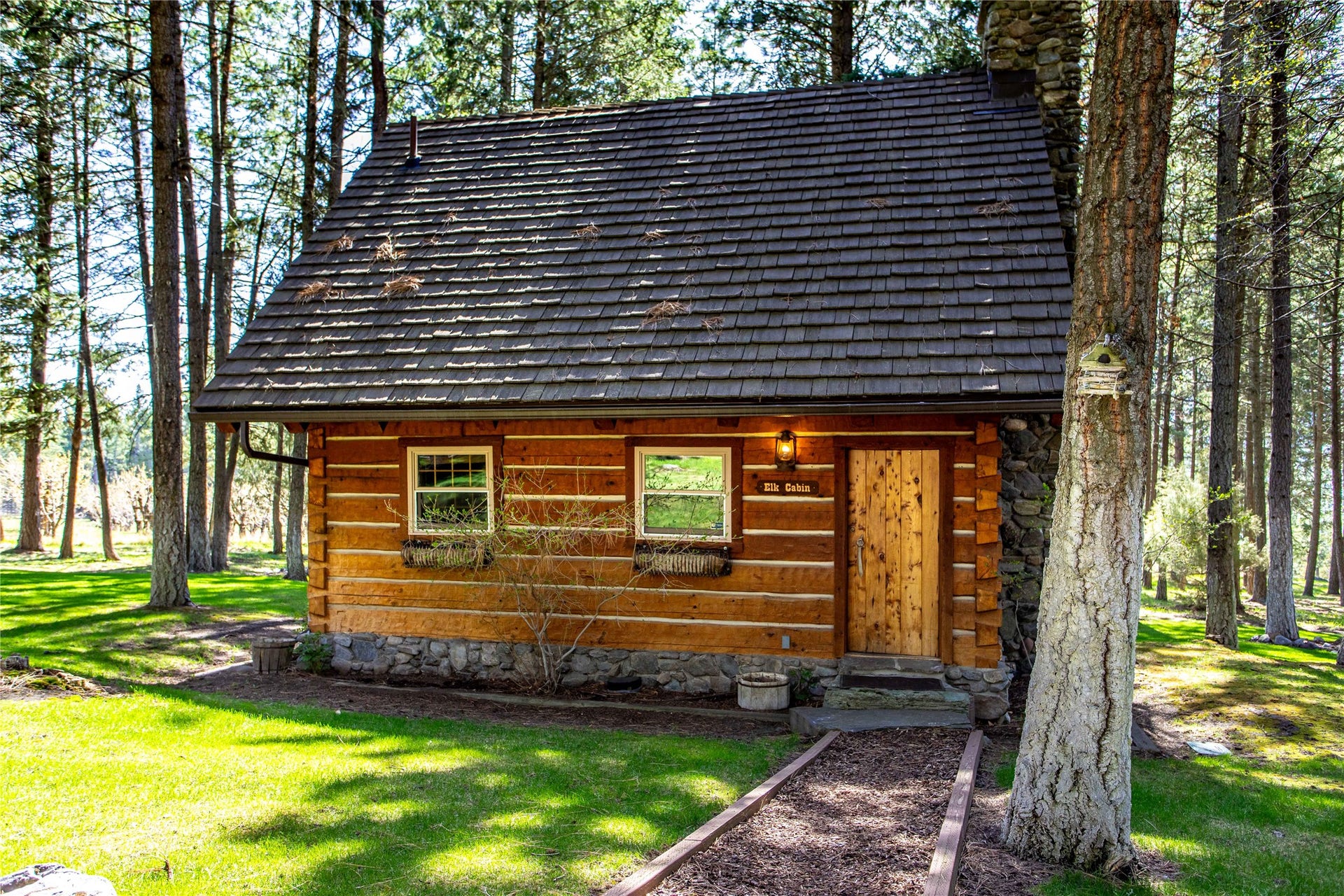 13518 Sylvan Drive, Bigfork, MT 59911 Elk Cabin view from back of cabin