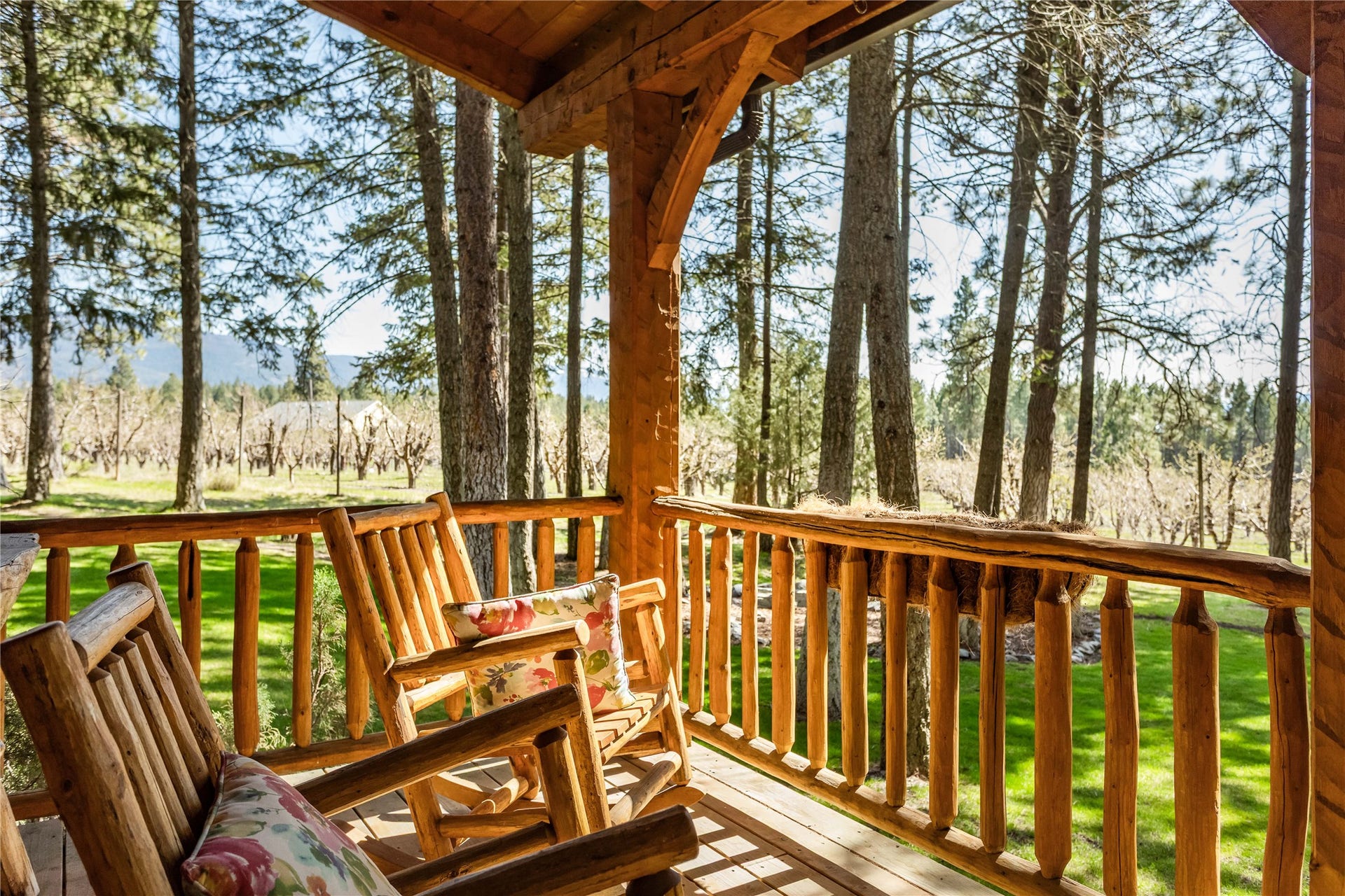 13518 Sylvan Drive, Bigfork, MT 59911 Elk Cabin cover deck looking towards Flathead Lake