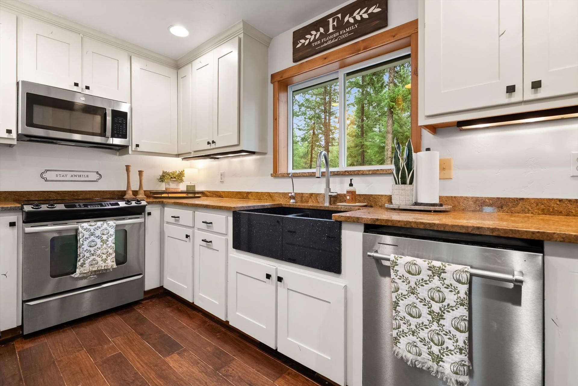 Chef-inspired kitchen featuring custom cabinets, solid granite countertops, and stainless steel appliances.