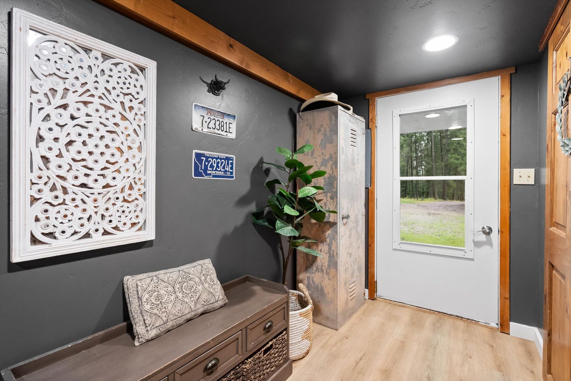 Essential for the mountain lifestyle: A dedicated entryway mud room keeps winter coats, hiking boots, and outdoor gear organized right as you step inside from Foothills Road adventures.