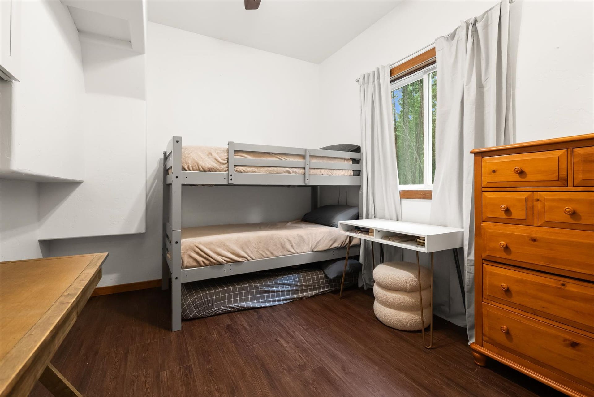 Thoughtfully laid out secondary bedrooms provide comfortable accommodations for family or guests.