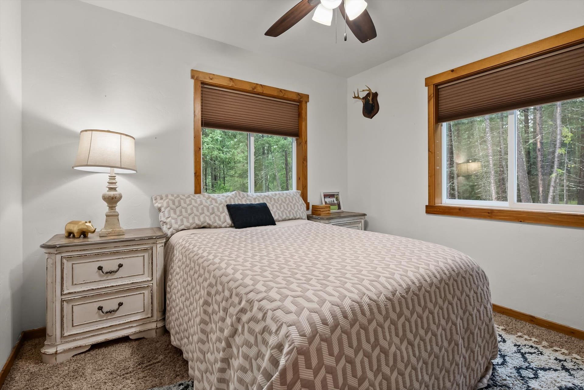 Thoughtfully laid out secondary bedrooms provide comfortable accommodations for family or guests.