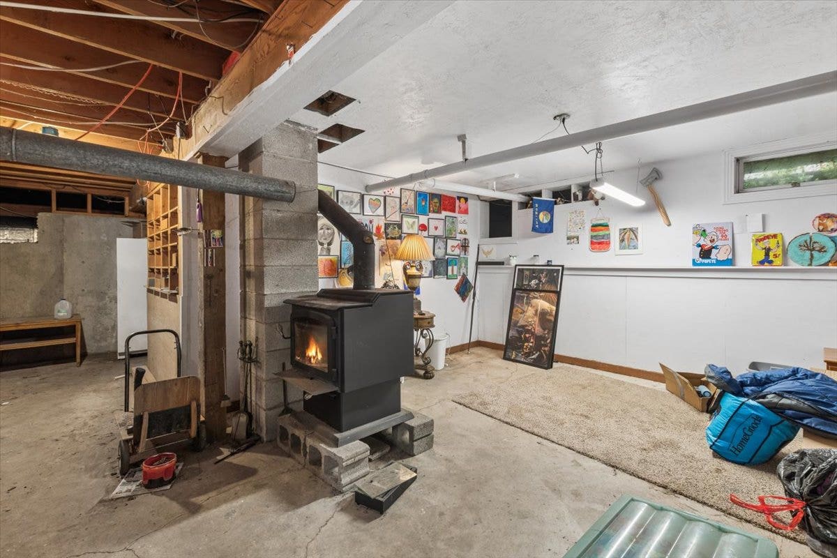 59 Ranchetts Lane, Bigfork, MT 59911 Full basement lots of storage and wood stove