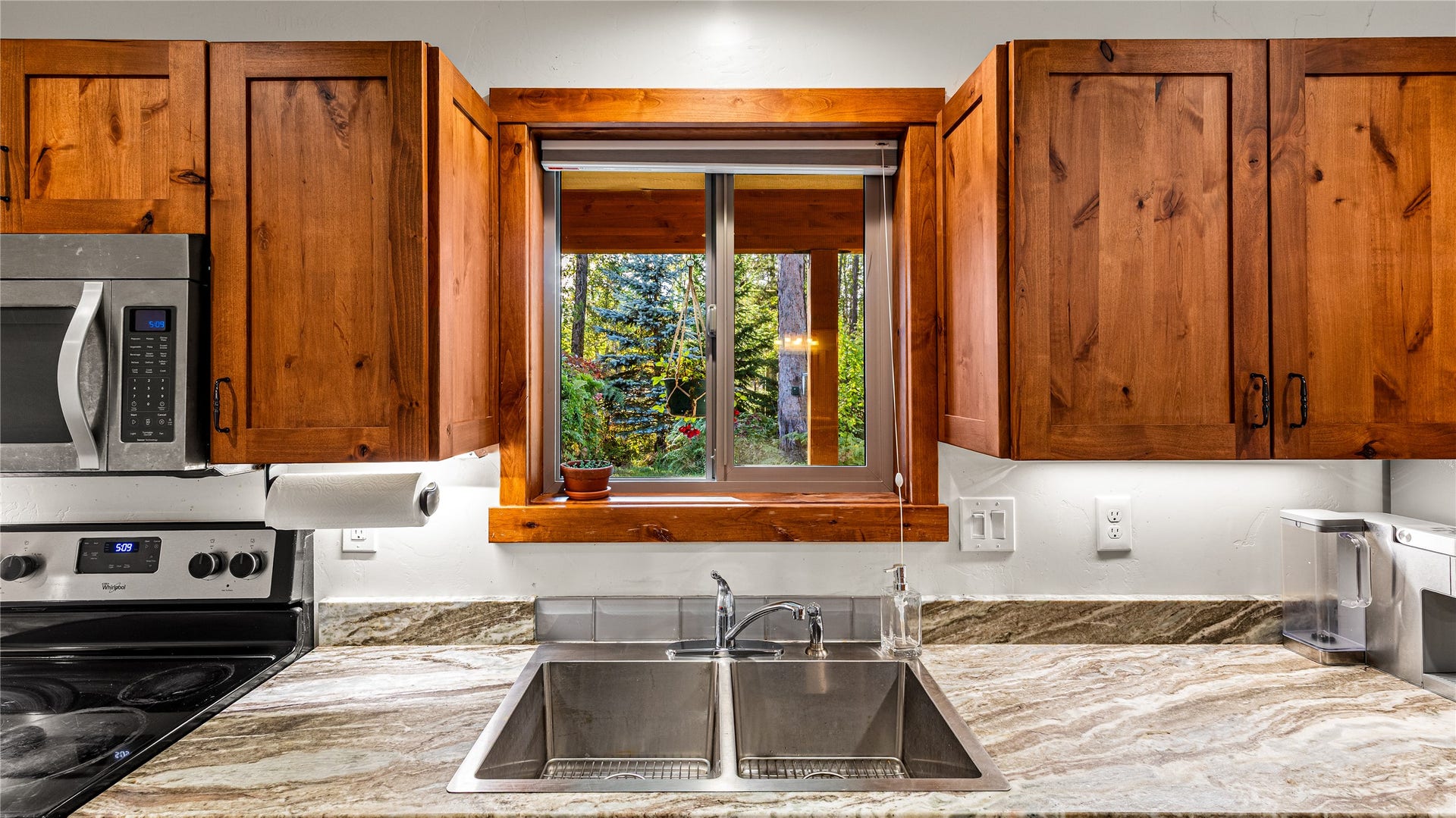 582 Ferndale Drive, Bigfork, MT 59911 Kitchen Sink with Garden Views