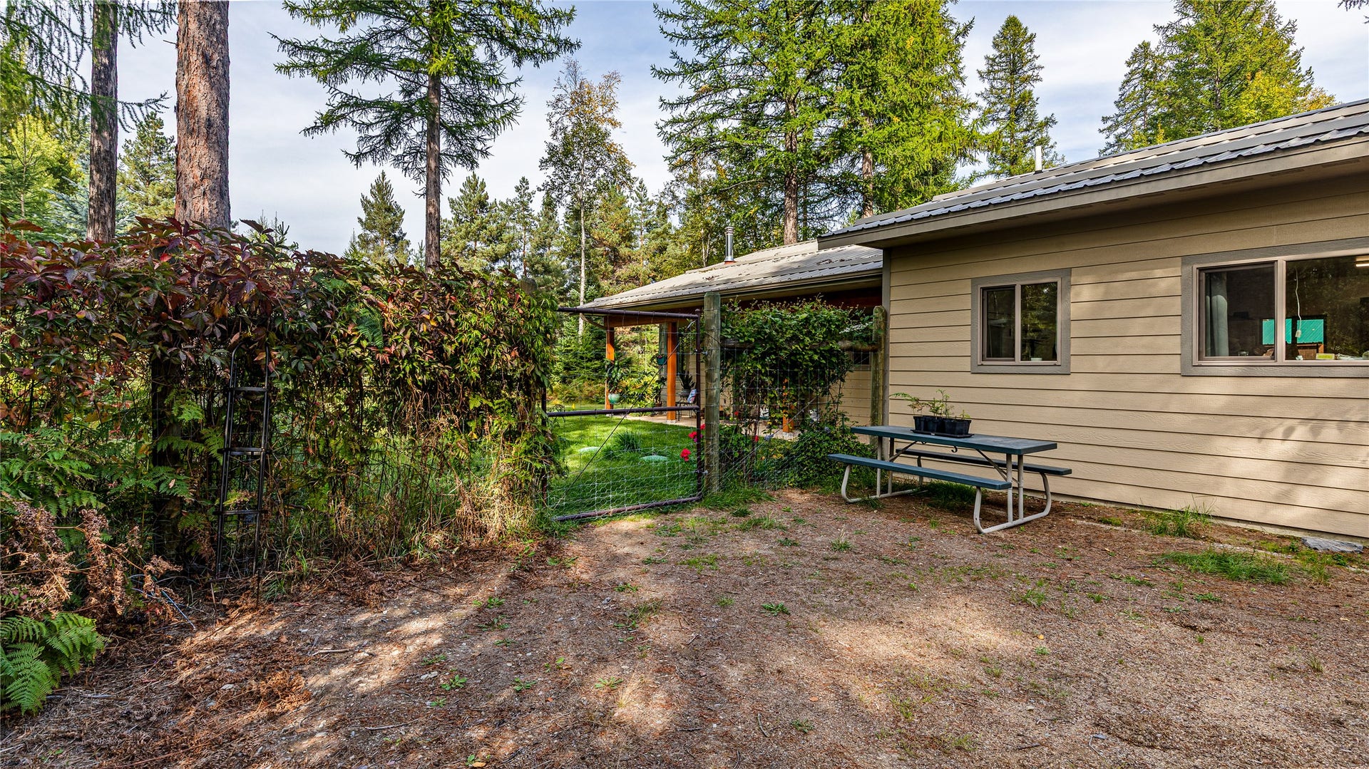 582 Ferndale Drive, Bigfork, MT 59911 Side Yard with Gate/Additional Parking