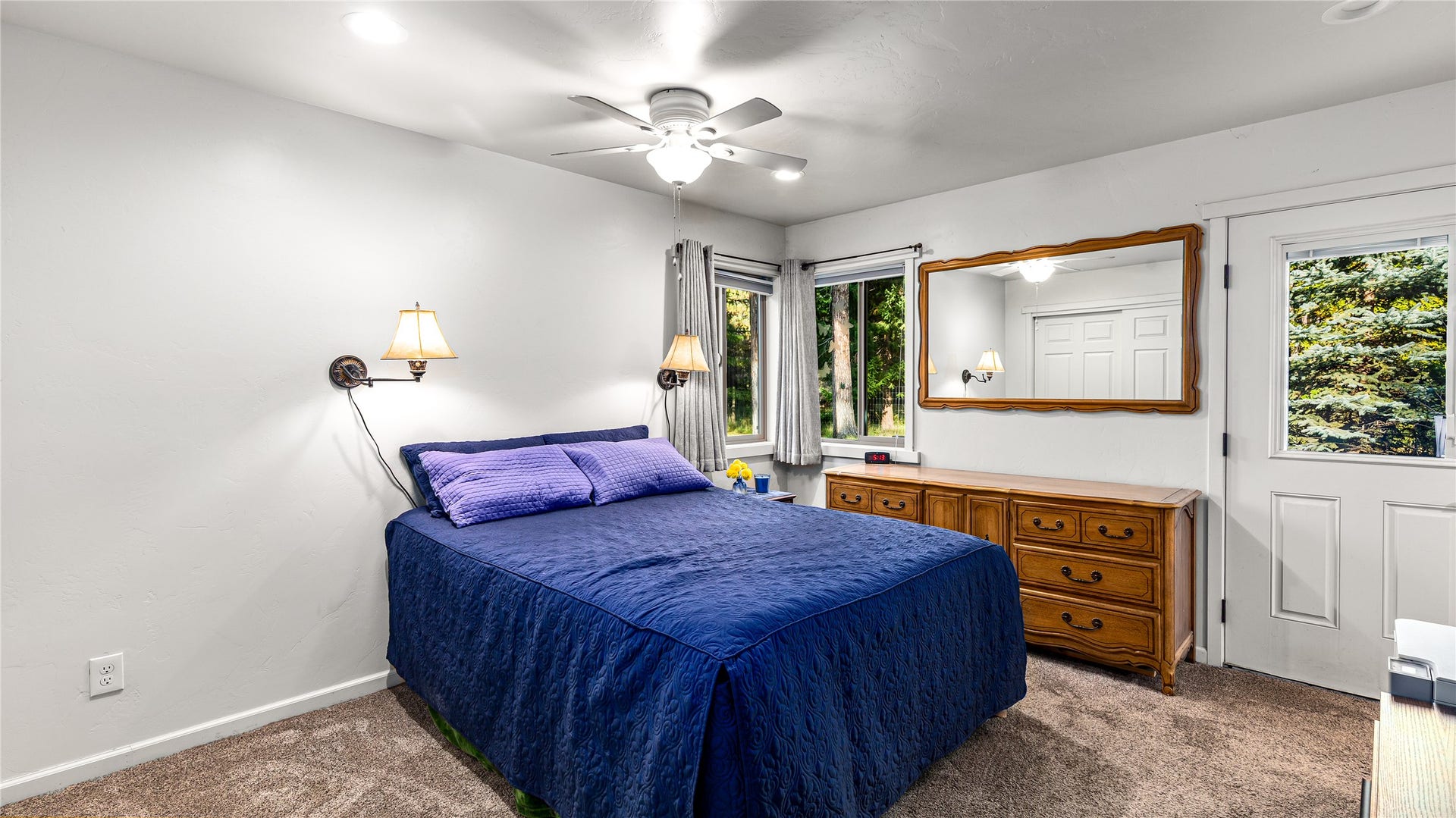 582 Ferndale Drive, Bigfork, MT 59911 Primary Bedroom with Ensuite bath and patio exit