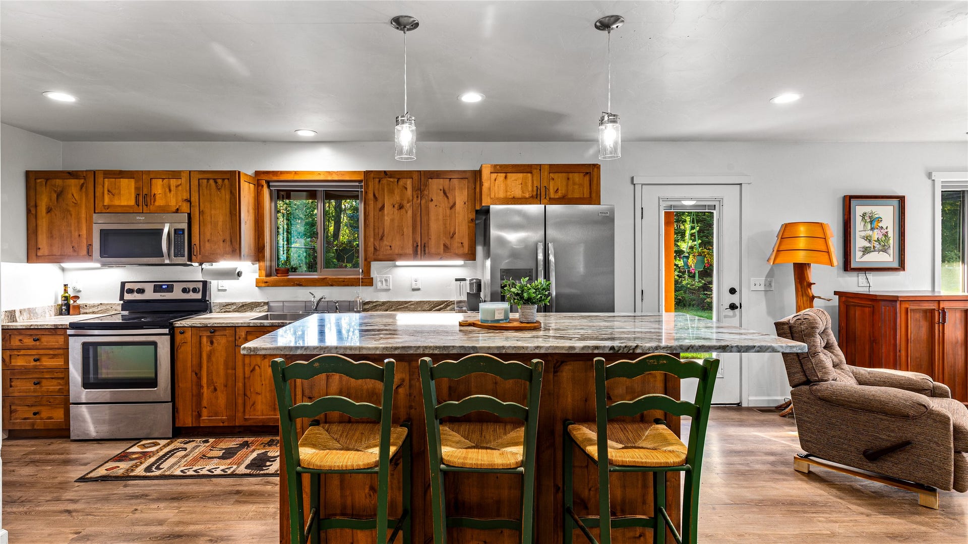 582 Ferndale Drive, Bigfork, MT 59911 Kitchen with granite and custom cabinetry