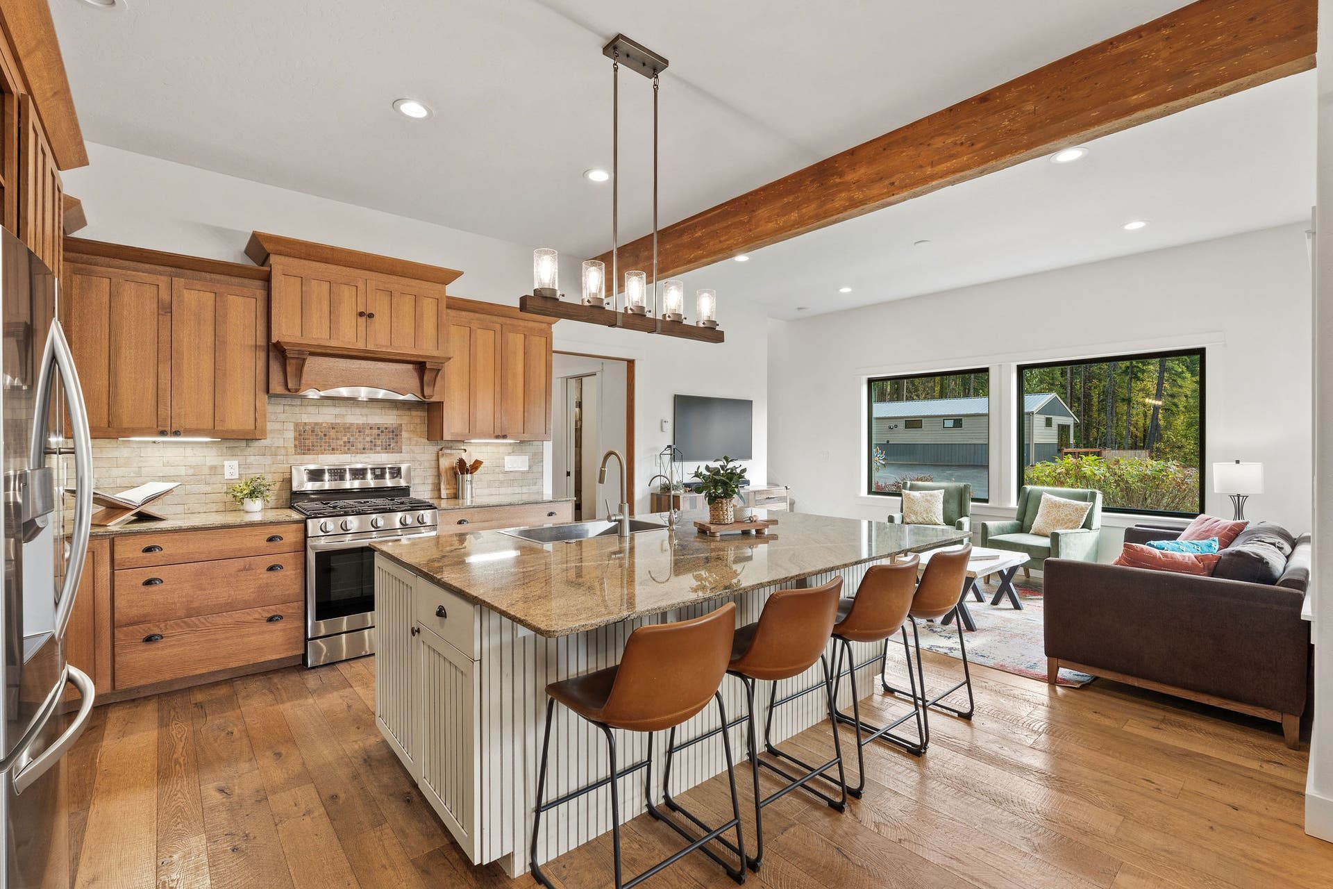 687 N Valley Drive, Whitefish, MT 59937 Large island anchors the airy kitchen with gorgeous granite countertop + under-cabinet lighting throughout.