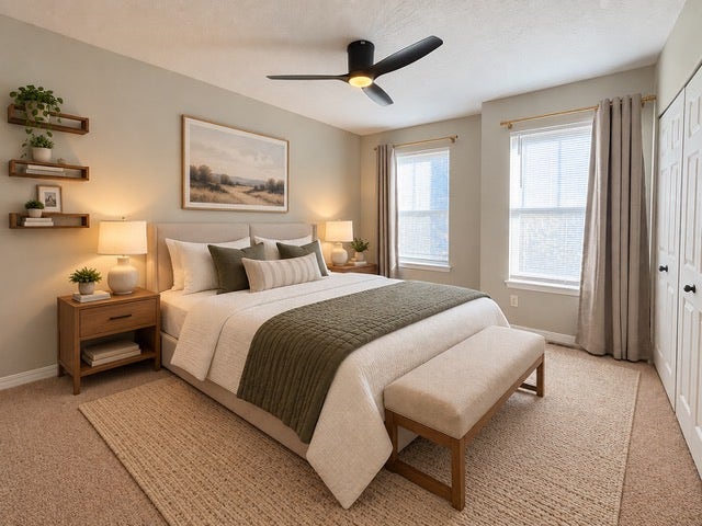 Recessed lighting, ceiling fan with integrated lighting, wood-finish shelving, two windows with blinds, and white bi-fold closet doors