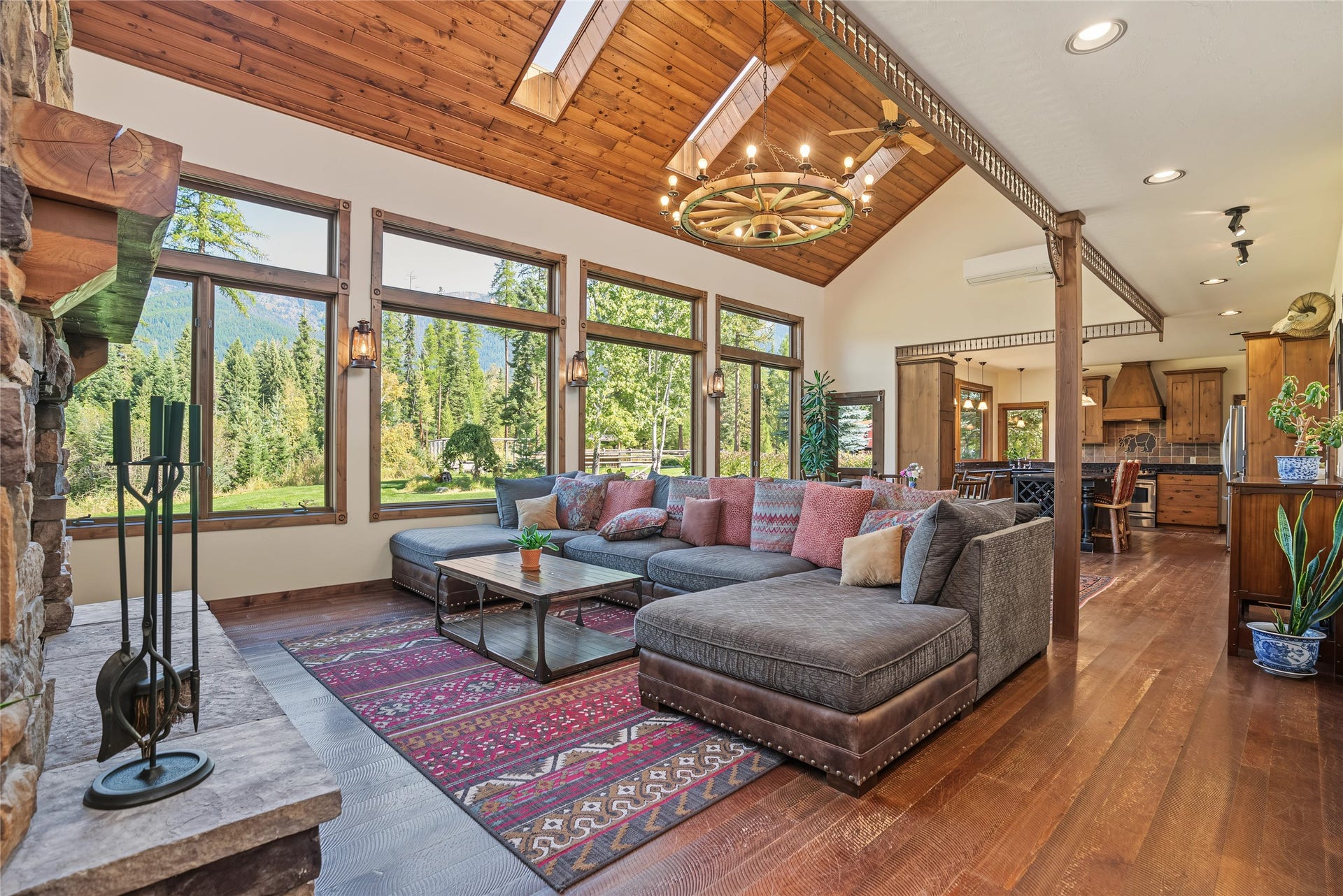 622 Wild Swan Trail, Bigfork, MT 59911 Expansive picture windows fill the home w/natural light