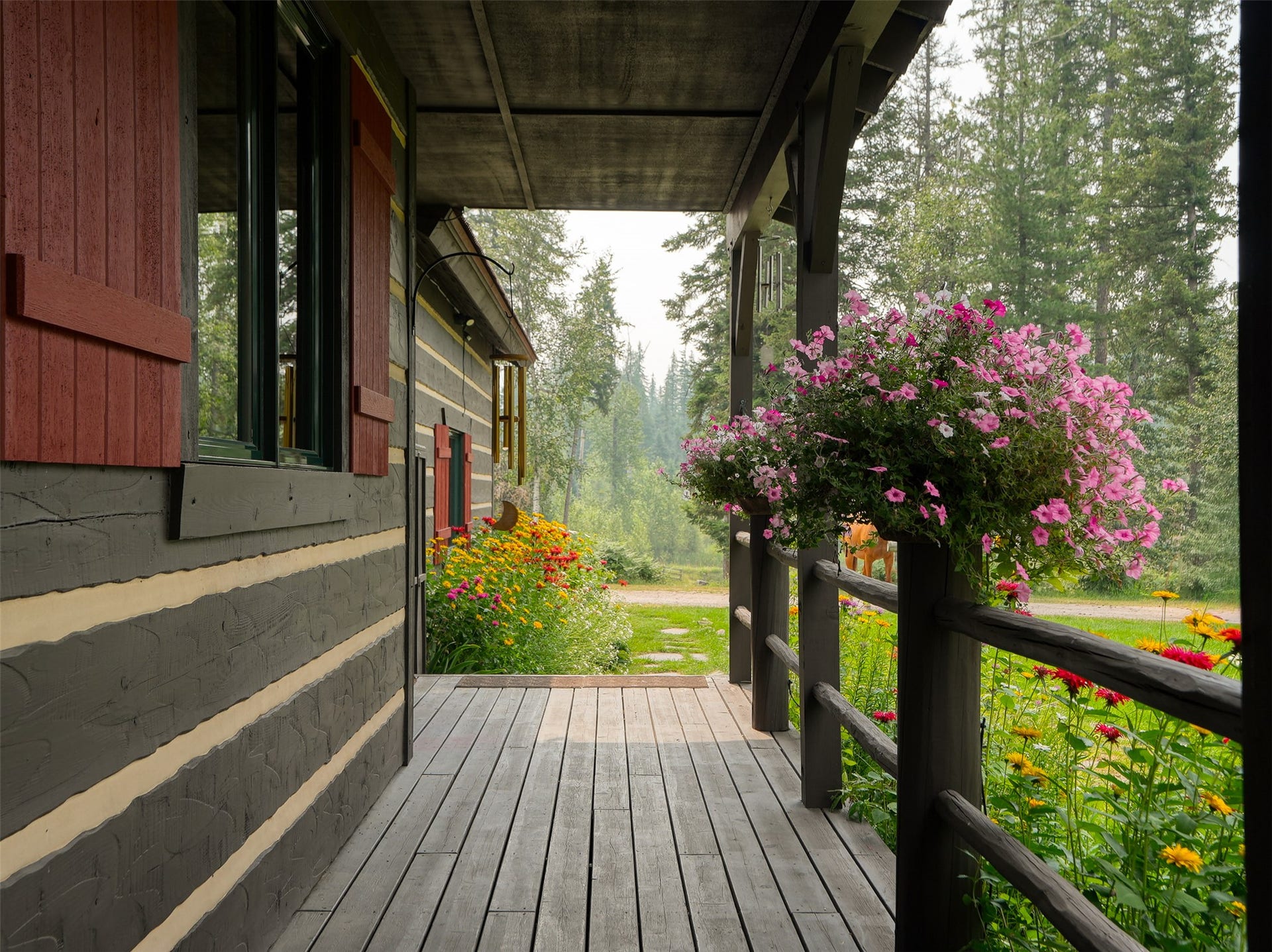 622 Wild Swan Trail, Bigfork, MT 59911 Main home front porch that wraps around