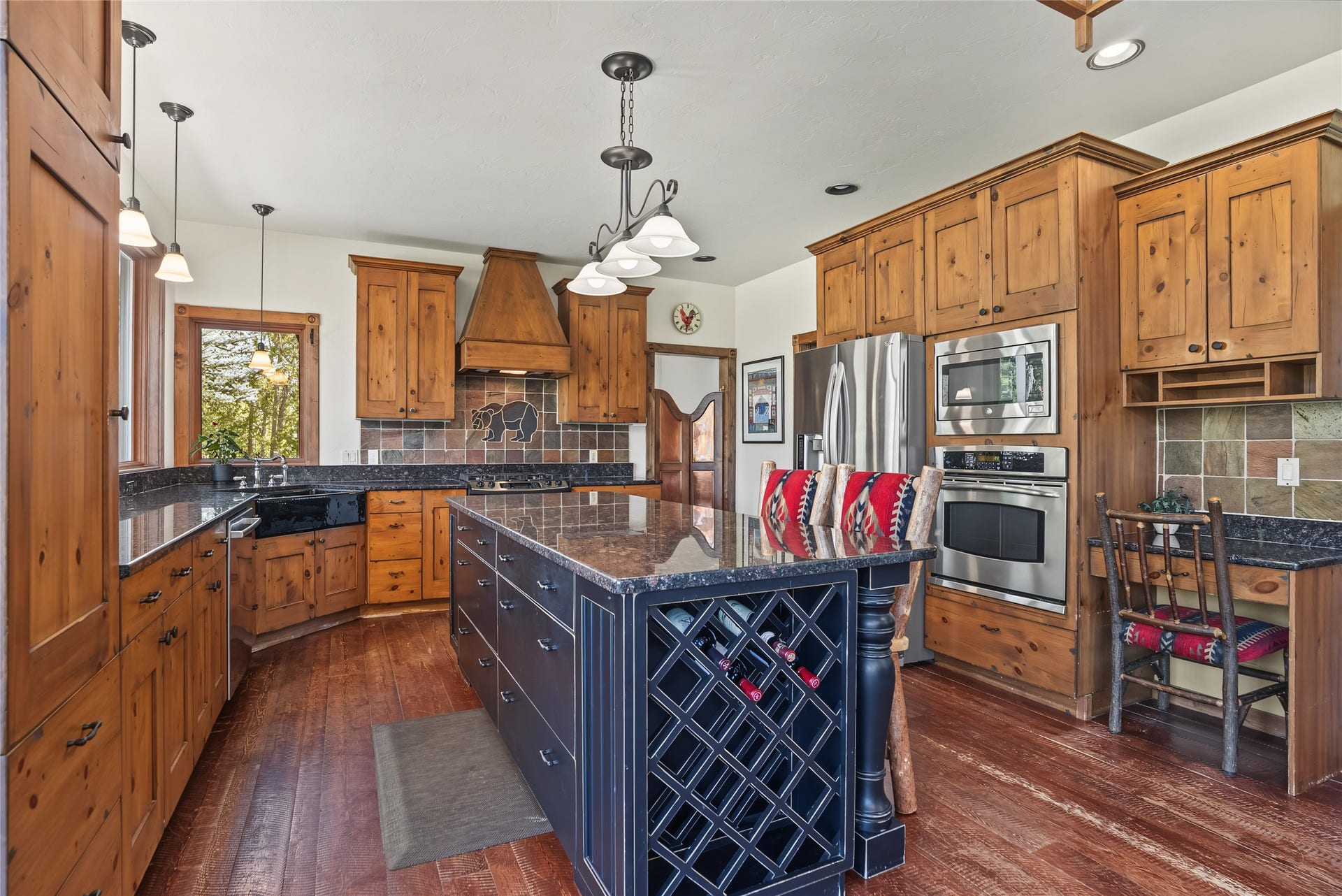 622 Wild Swan Trail, Bigfork, MT 59911 Kitchen has GE wall oven, wall microwave, gas range, Bosch dishwasher, LG refrigerator
