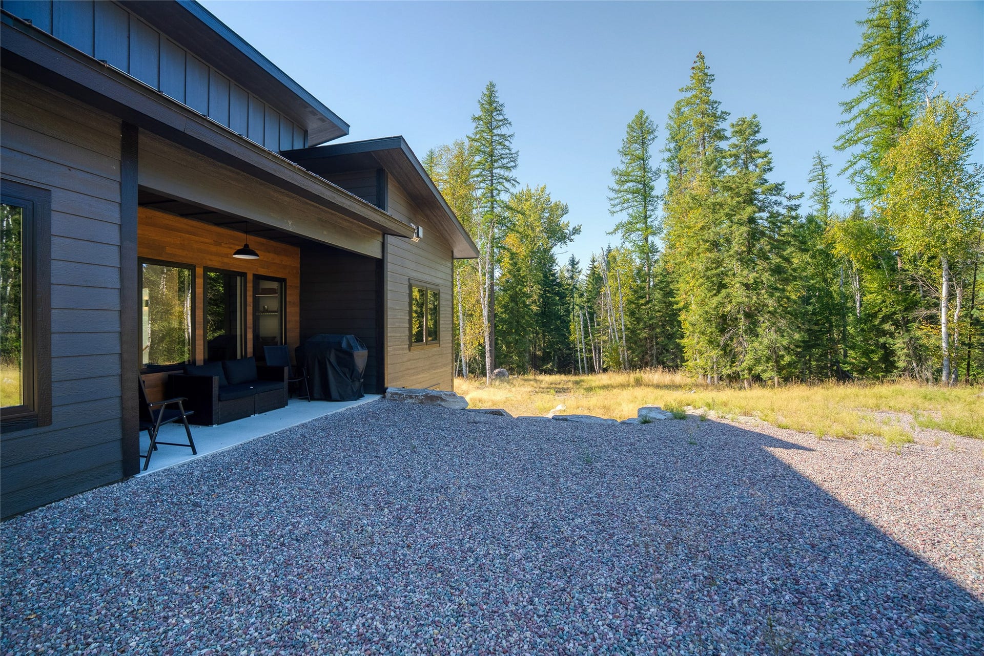 622 Wild Swan Trail, Bigfork, MT 59911 Guest home main level back patio