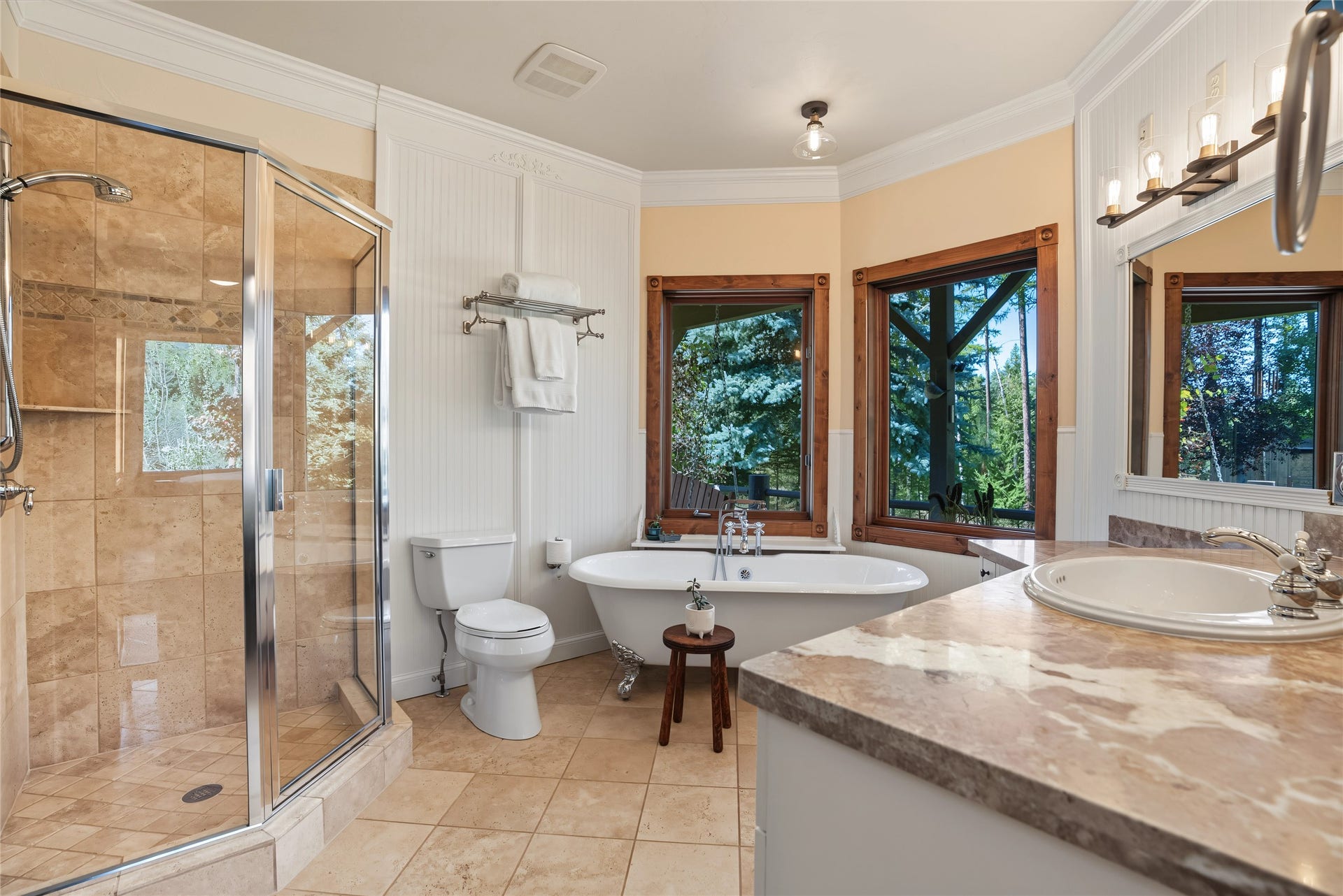622 Wild Swan Trail, Bigfork, MT 59911 Primary bath with tub and shower and walk in closet