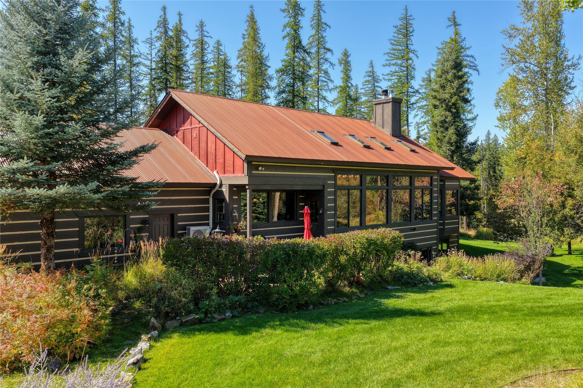 622 Wild Swan Trail, Bigfork, MT 59911 Main home front exterior w/beautiful landscape