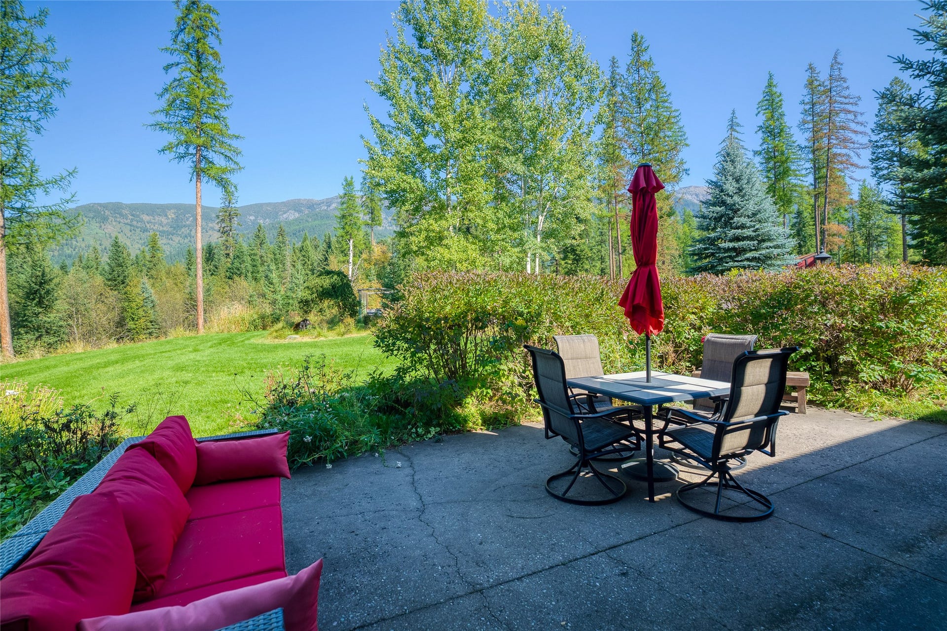 622 Wild Swan Trail, Bigfork, MT 59911 Main home back patio w/mountain views