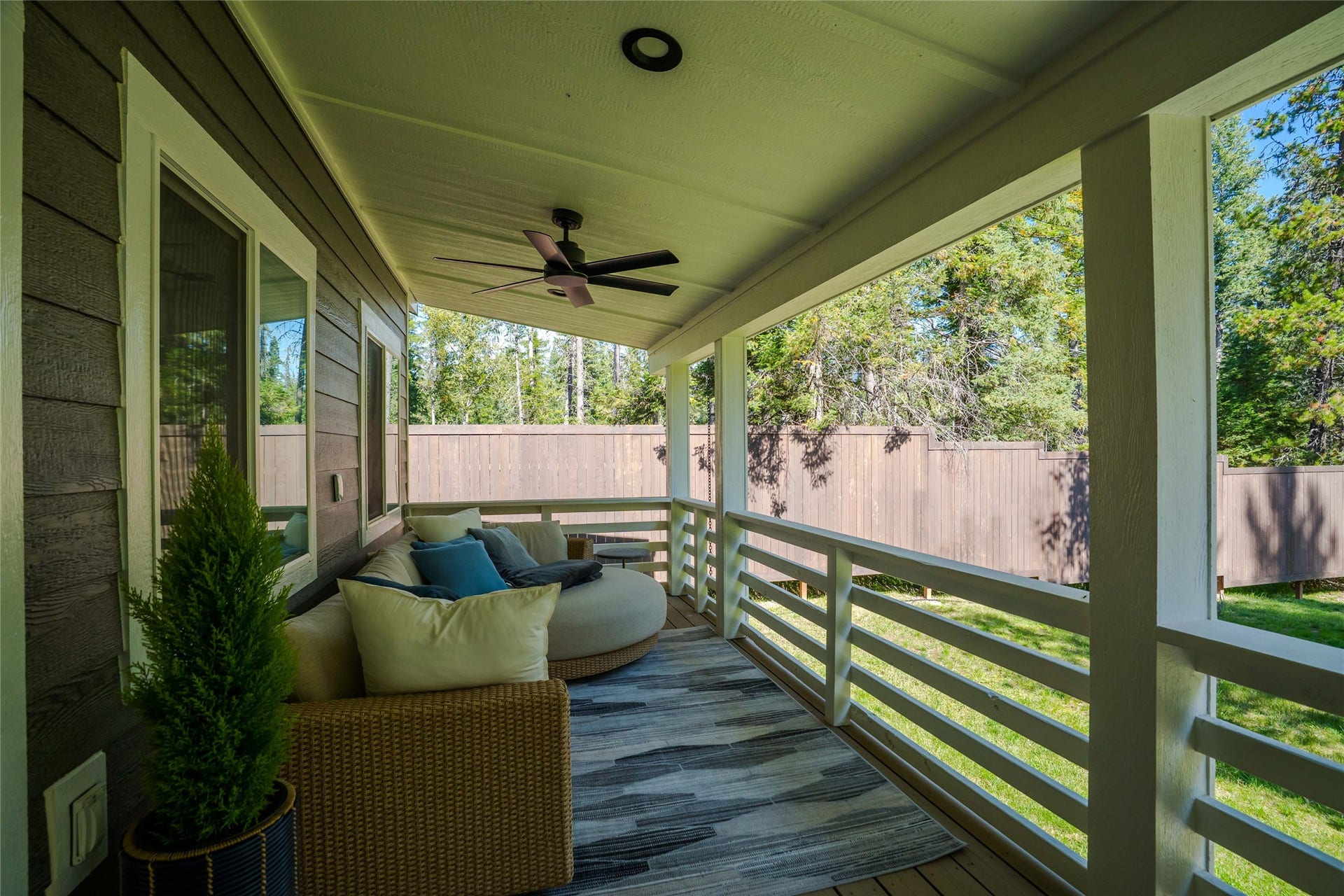 4926 Foothill Road, Bigfork, MT 59911 North side porch with a door to the Primary bedroom