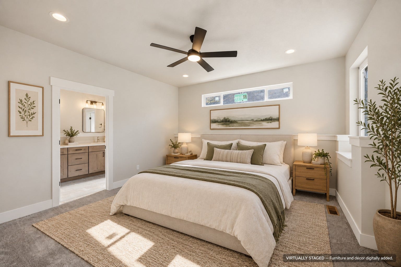 Recessed lighting, ceiling fan, transom windows, and an en-suite bathroom with a vanity and mirror
