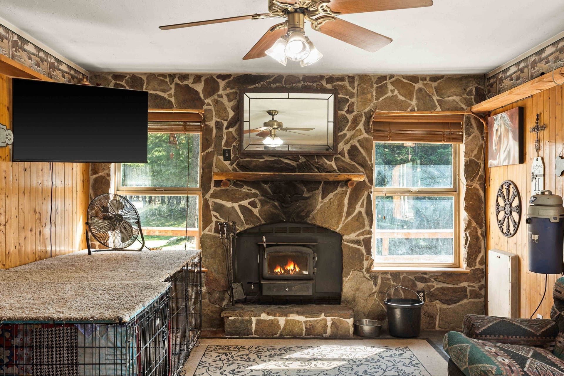 19605 Bower Lane, Proctor, MT 59929 Family Room Fireplace with heat insert