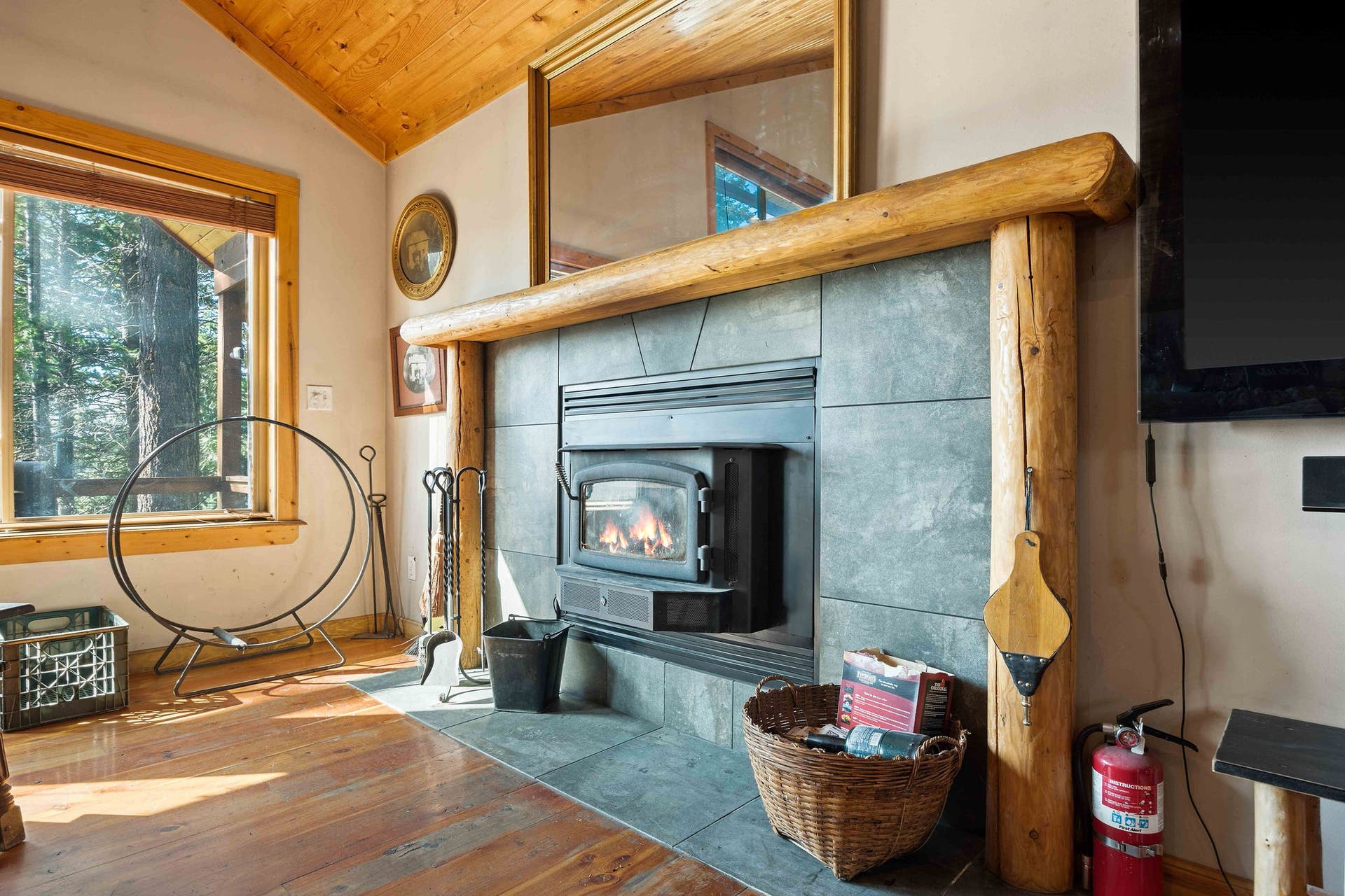 19605 Bower Lane, Proctor, MT 59929 Great Room Fireplace with heat insert
