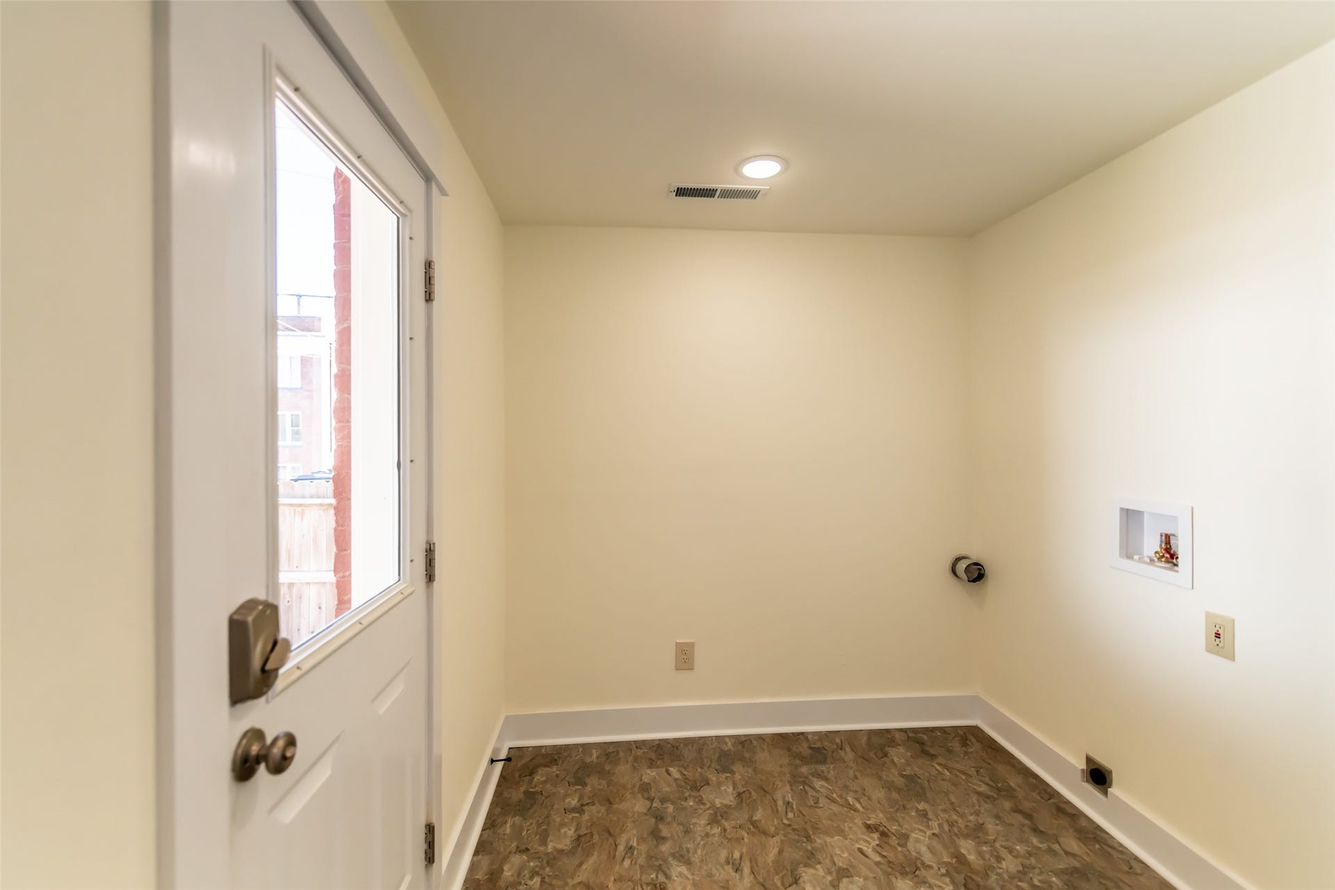 705 W Park Street, Butte, MT 59701 Utility area featuring wood-finish flooring, recessed lighting, and a white paneled door with glass insert
