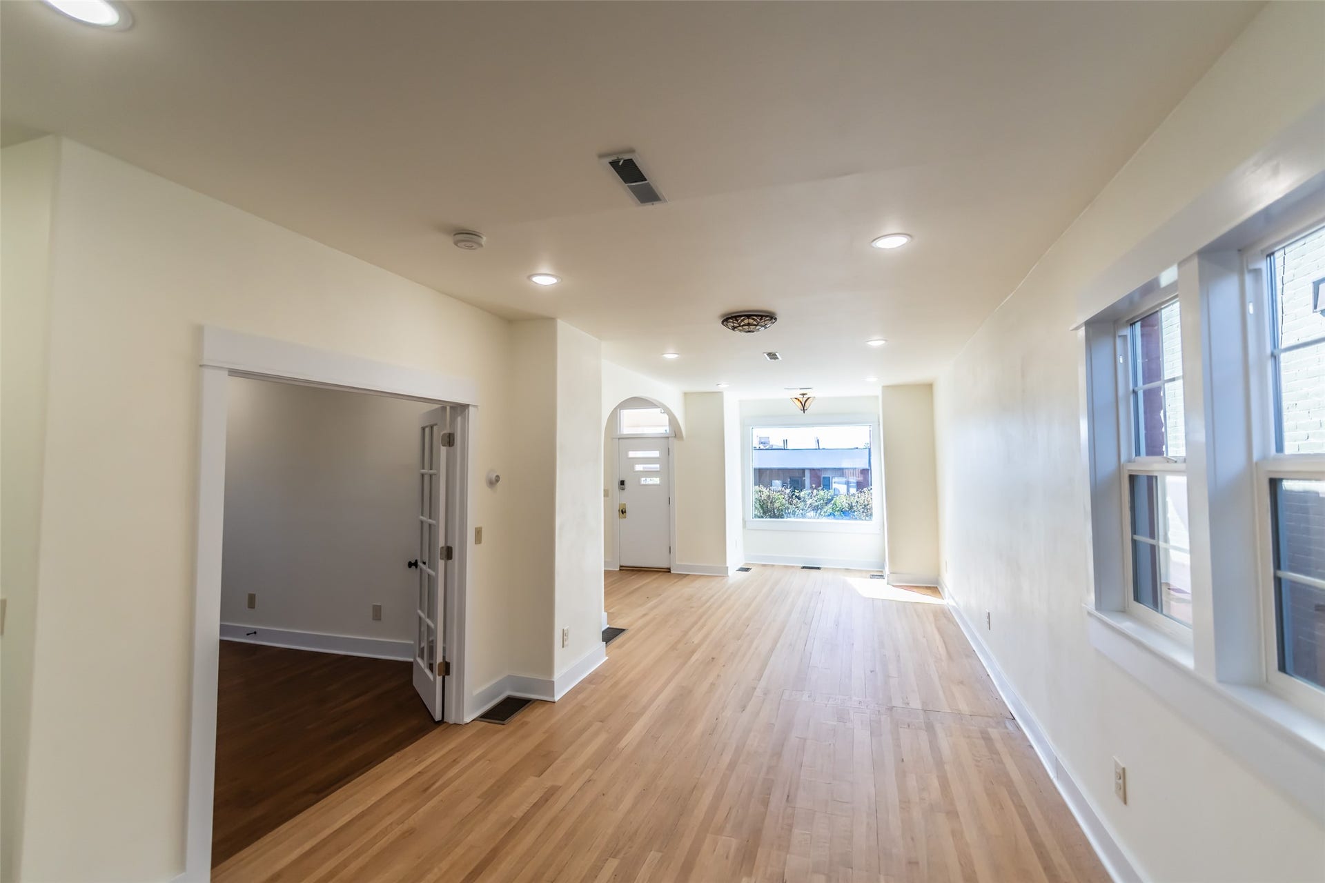 705 W Park Street, Butte, MT 59701 Hardwood flooring, recessed lighting, arched entryway, and double French doors