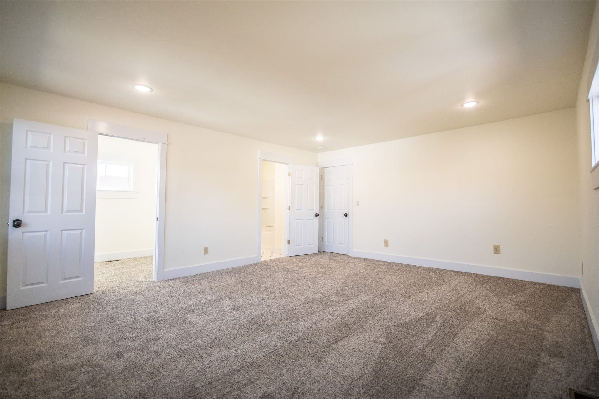 705 W Park Street, Butte, MT 59701 Plush carpet flooring, recessed lighting, white trim, and white six-panel doors