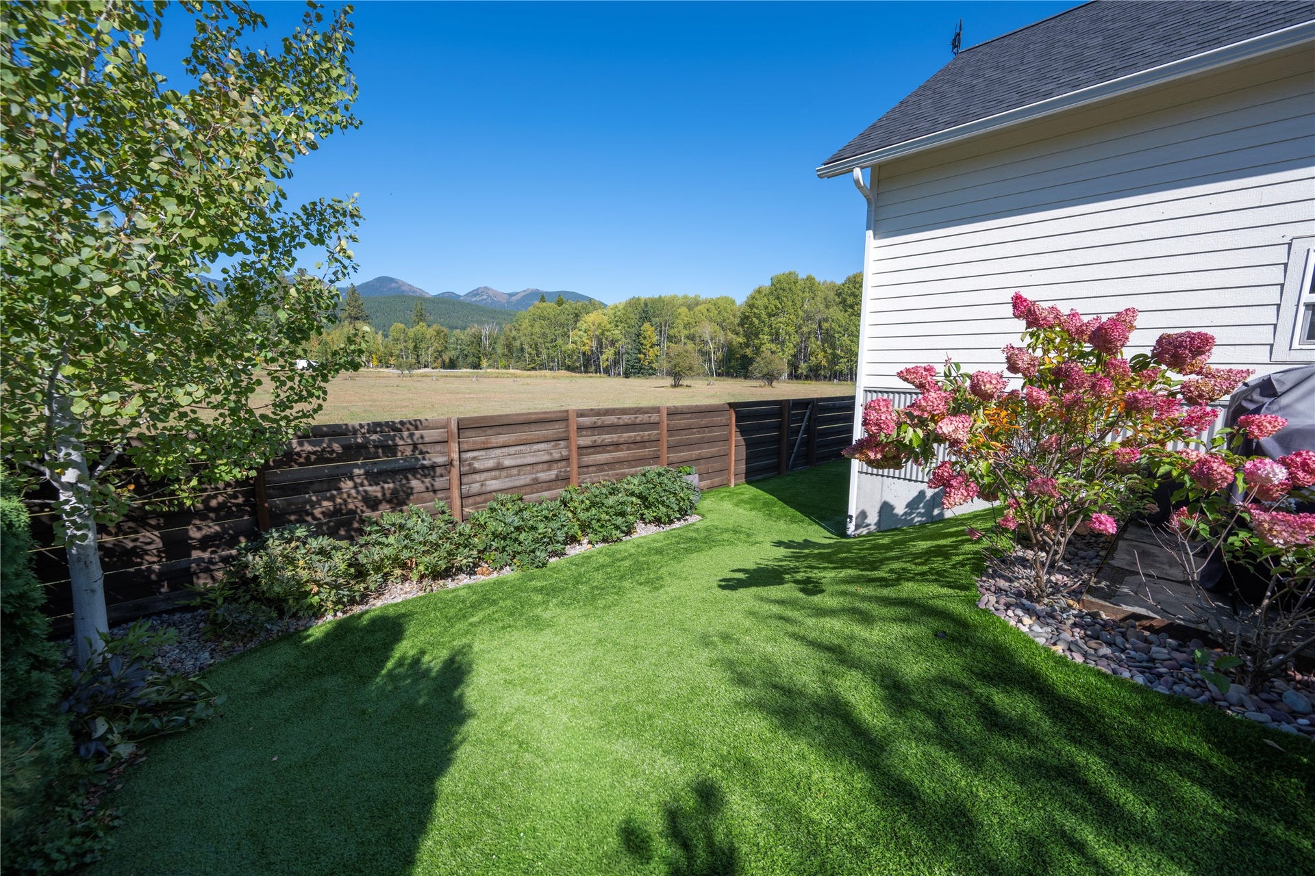 Maintenance free turf, fenced in yard