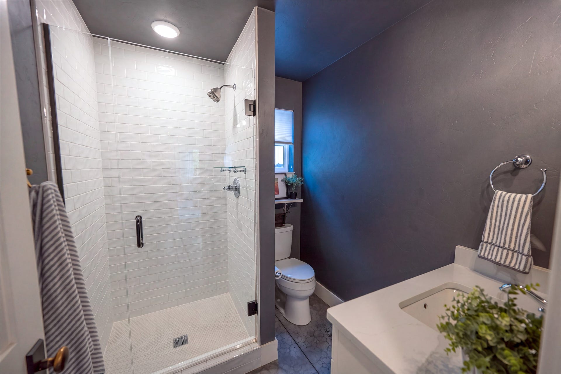 Main level 3/4 bath adjacent to bedroom/office