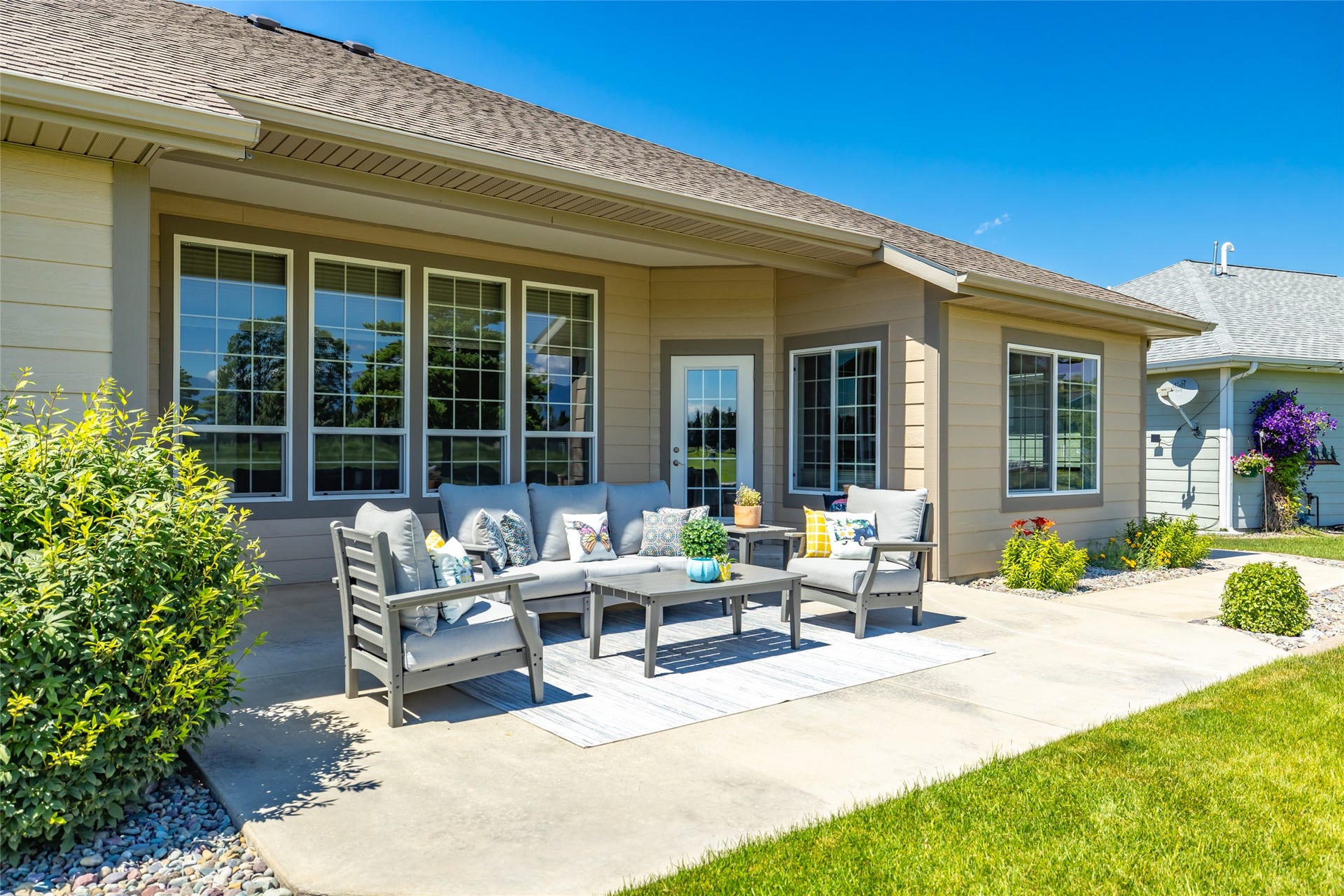 177 Palmer Drive, Kalispell, MT 59901 Partially covered concrete patio provides evening shade