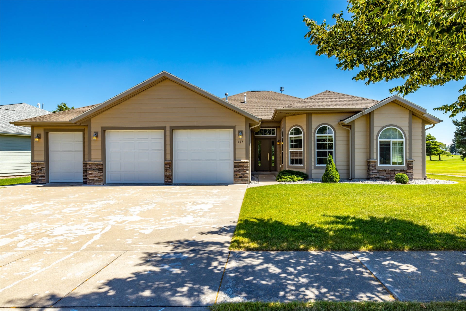 177 Palmer Drive, Kalispell, MT 59901 Ranch-style exterior with tan siding and stone accents