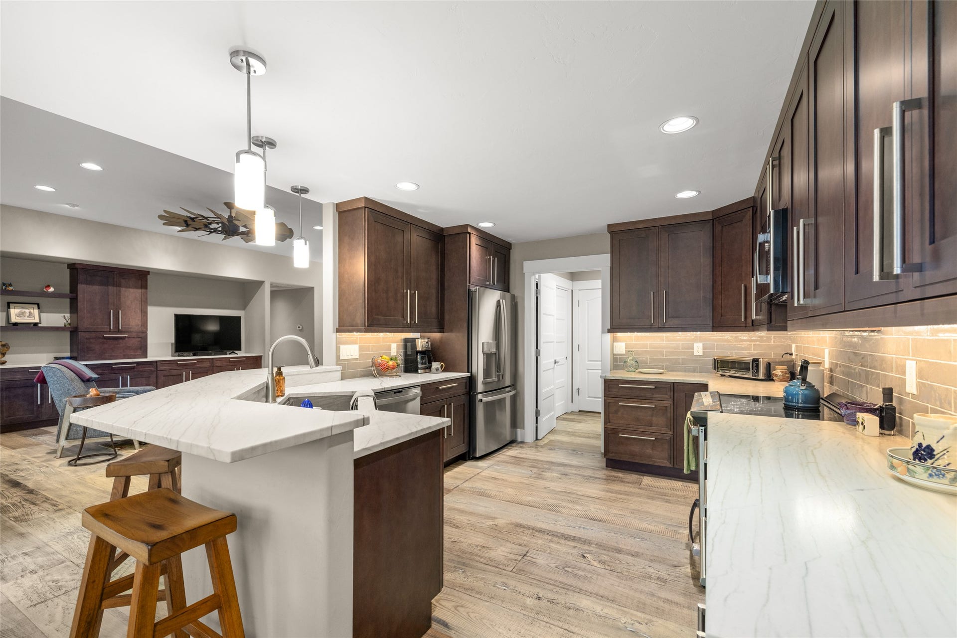 177 Palmer Drive, Kalispell, MT 59901 Expansive kitchen featuring dark wood cabinetry, light-toned countertops, and