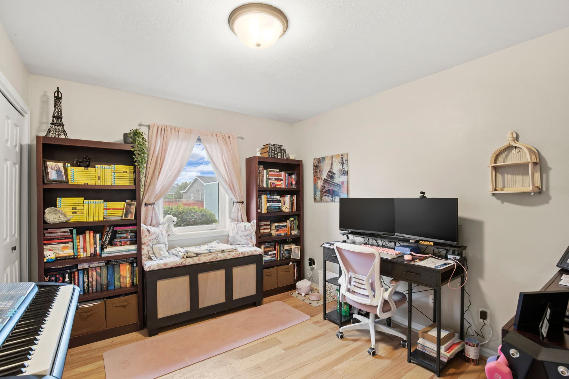 2541 Castle Pines Way, Great Falls, MT 59405 Recessed window with built-in storage bench, light wood-finish flooring, and ceiling-mounted light fixture