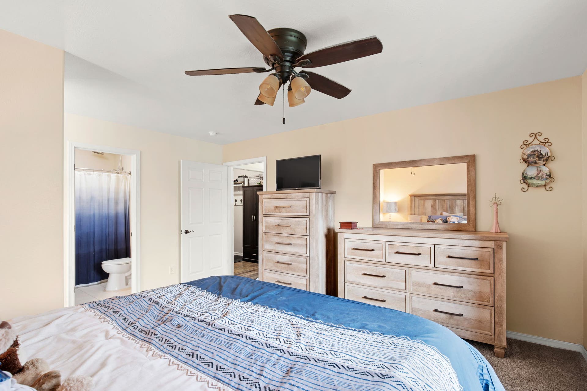 2541 Castle Pines Way, Great Falls, MT 59405 Ceiling fan with integrated lighting, wall-to-wall carpeting, and a white interior door