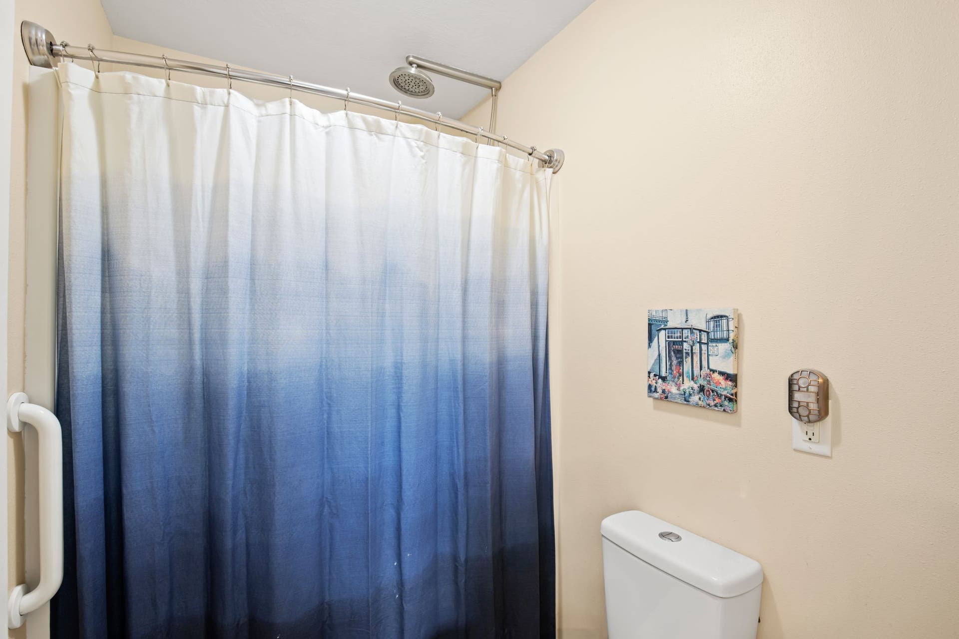 2541 Castle Pines Way, Great Falls, MT 59405 Shower with a rainfall showerhead and a toilet