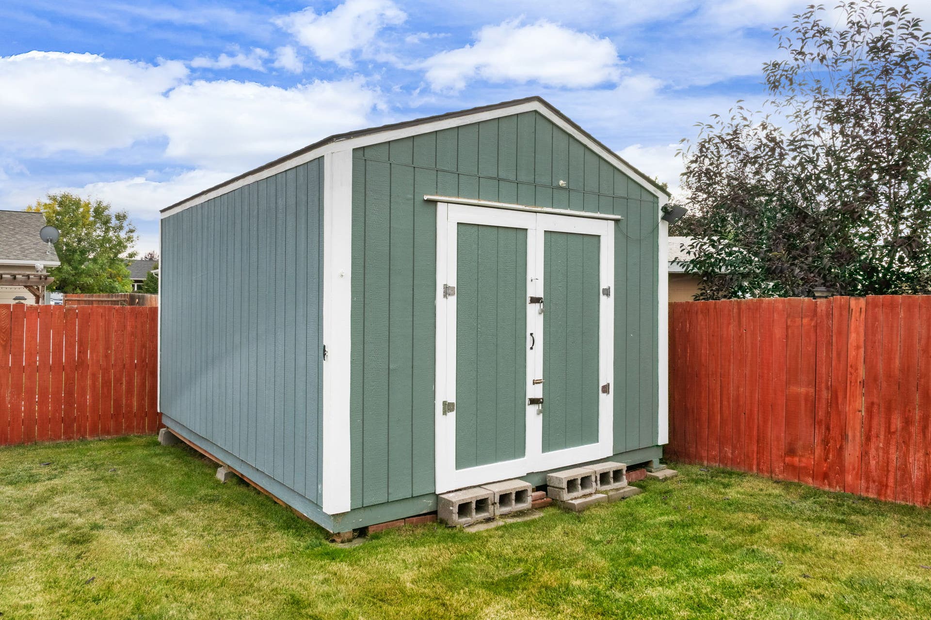 2541 Castle Pines Way, Great Falls, MT 59405 Detached shed with board-and-batten siding, white trim, and double doors