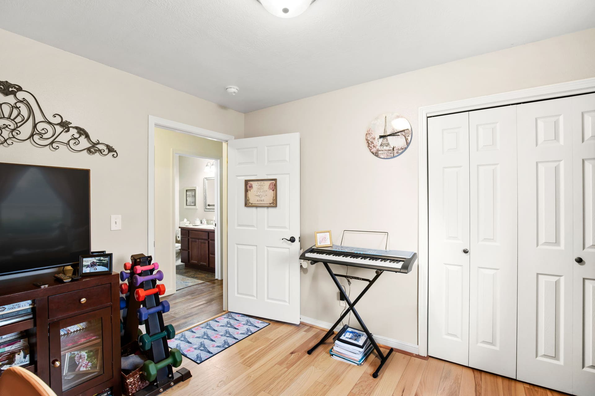 2541 Castle Pines Way, Great Falls, MT 59405 Light wood-finish flooring, white bi-fold closet doors, and recessed ceiling lighting