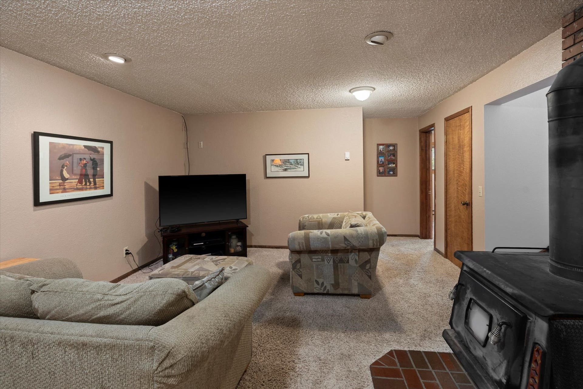 4955 Foothill Road, Bigfork, MT 59911 lower level living room