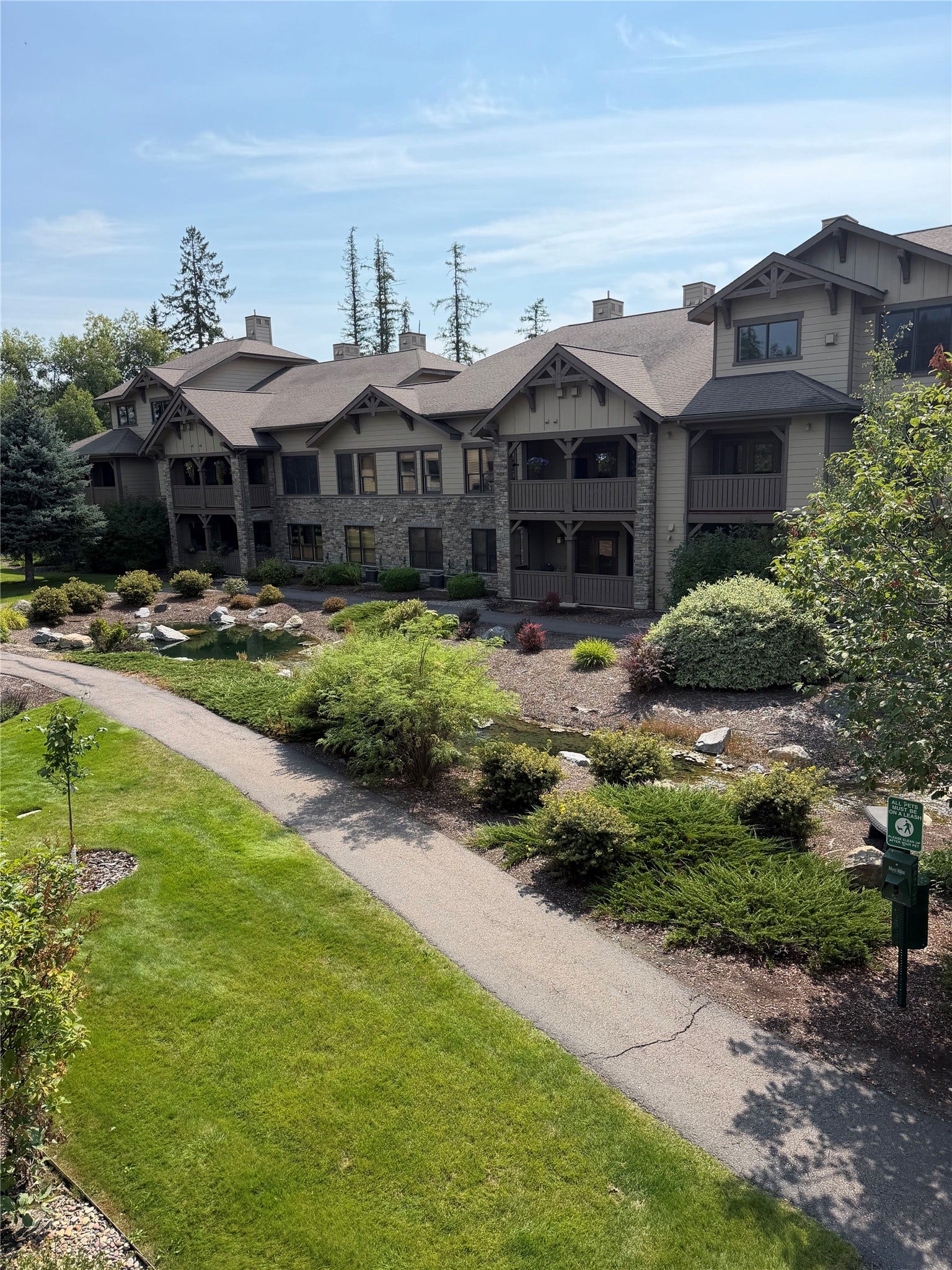 6007 St Moritz Drive, #D, Whitefish, MT 59937 Walkway through the neighborhood view from Deck