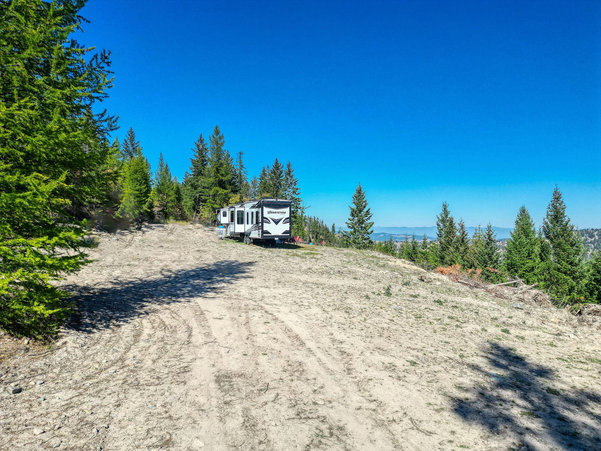 Level building bench on top of property, Flathead Valley & Whitefish Mountain Resort views, RV Negotiable