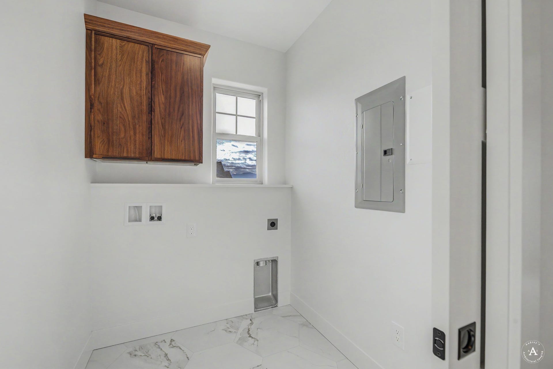 2754 Lone Chief Loop, Helena, MT 59601 White walls with a window, wood-finish cabinetry, and tiled flooring