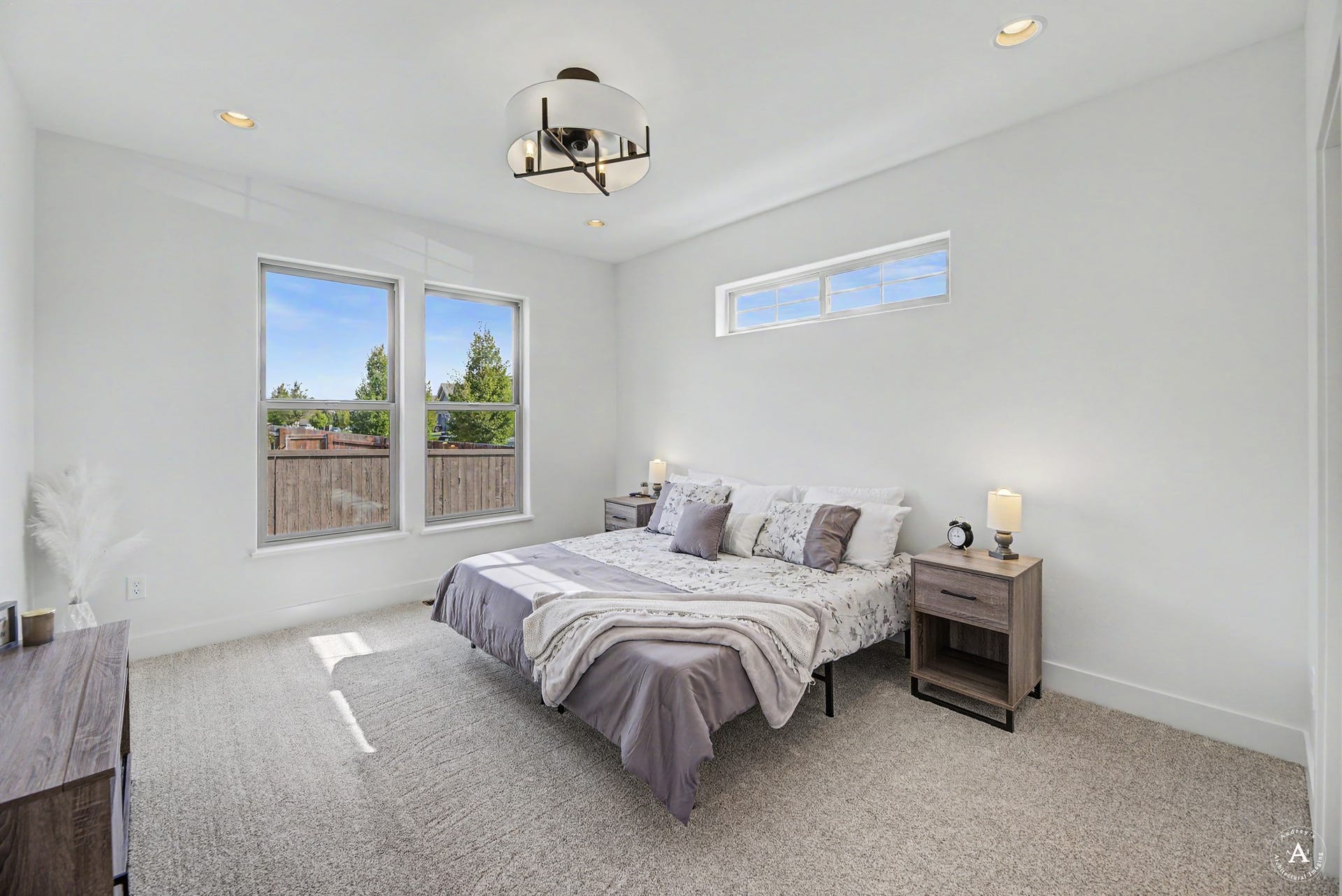 2754 Lone Chief Loop, Helena, MT 59601 Recessed lighting, central ceiling light fixture, two large windows, one transom window, and light-toned carpeting