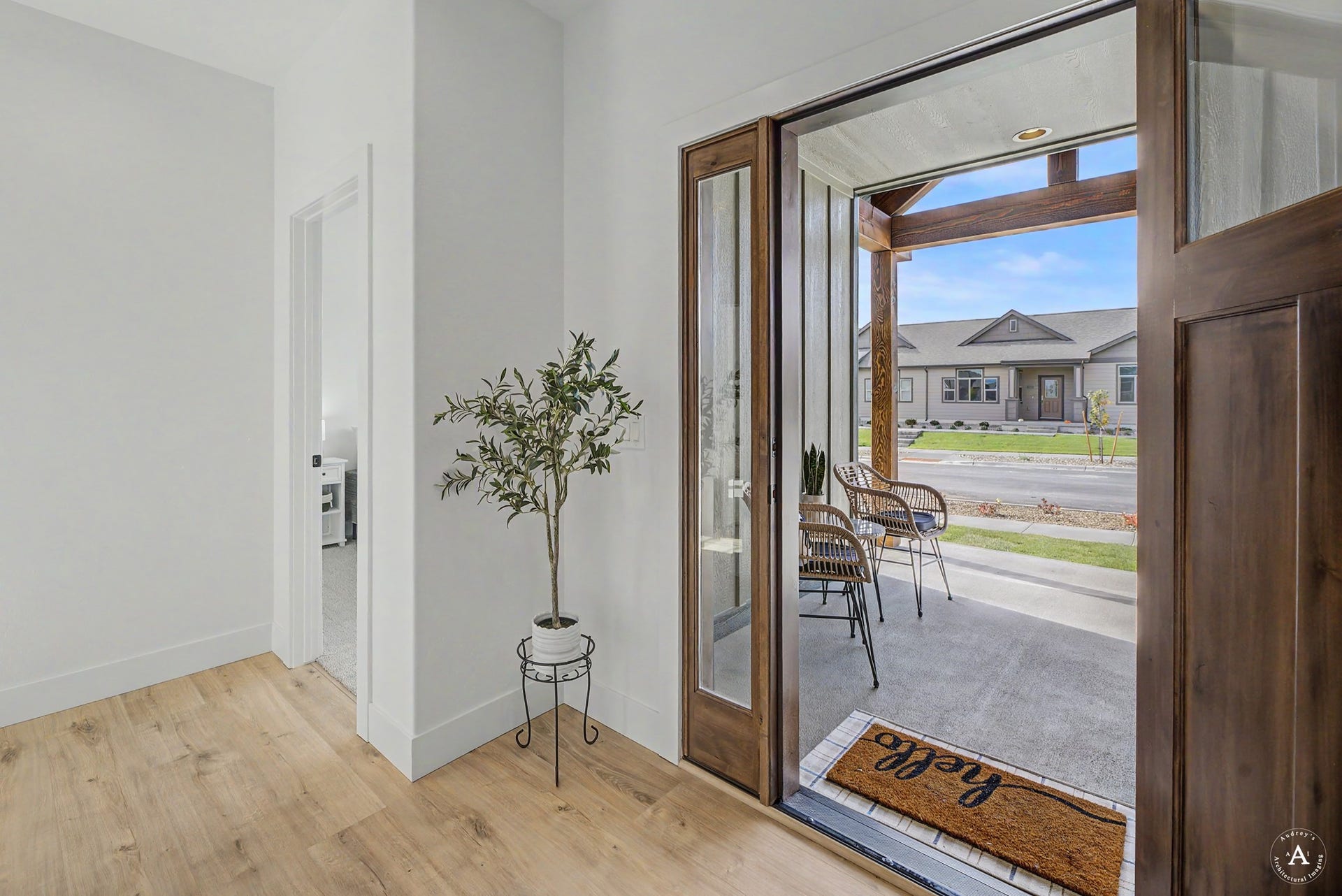 2754 Lone Chief Loop, Helena, MT 59601 Entryway featuring wood-finish flooring and a wood-paneled door with sidelight