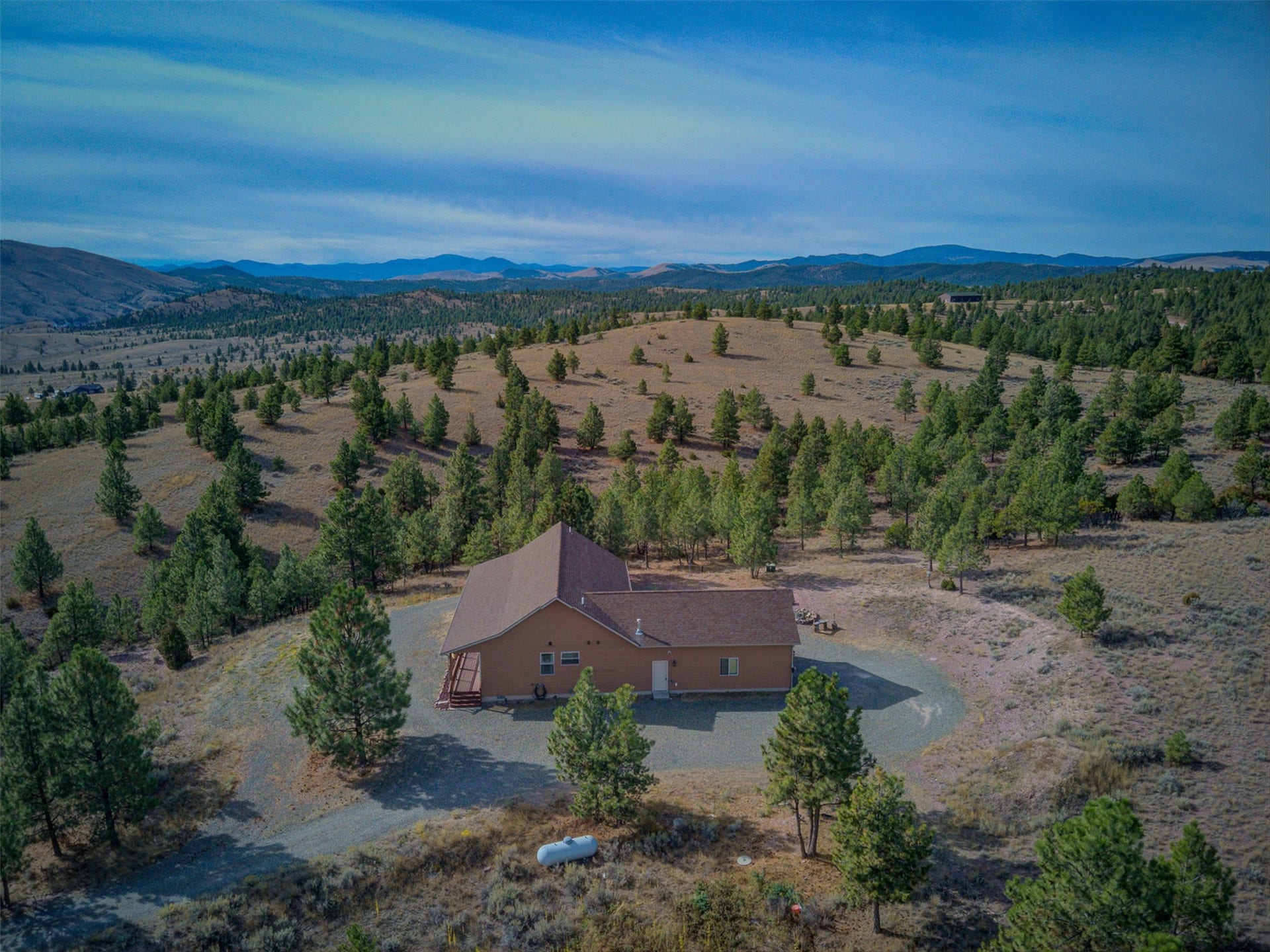 8224 Hillside Drive, Helena, MT 59602 Ranch-style residence featuring a prominent gabled roof and covered front entrance