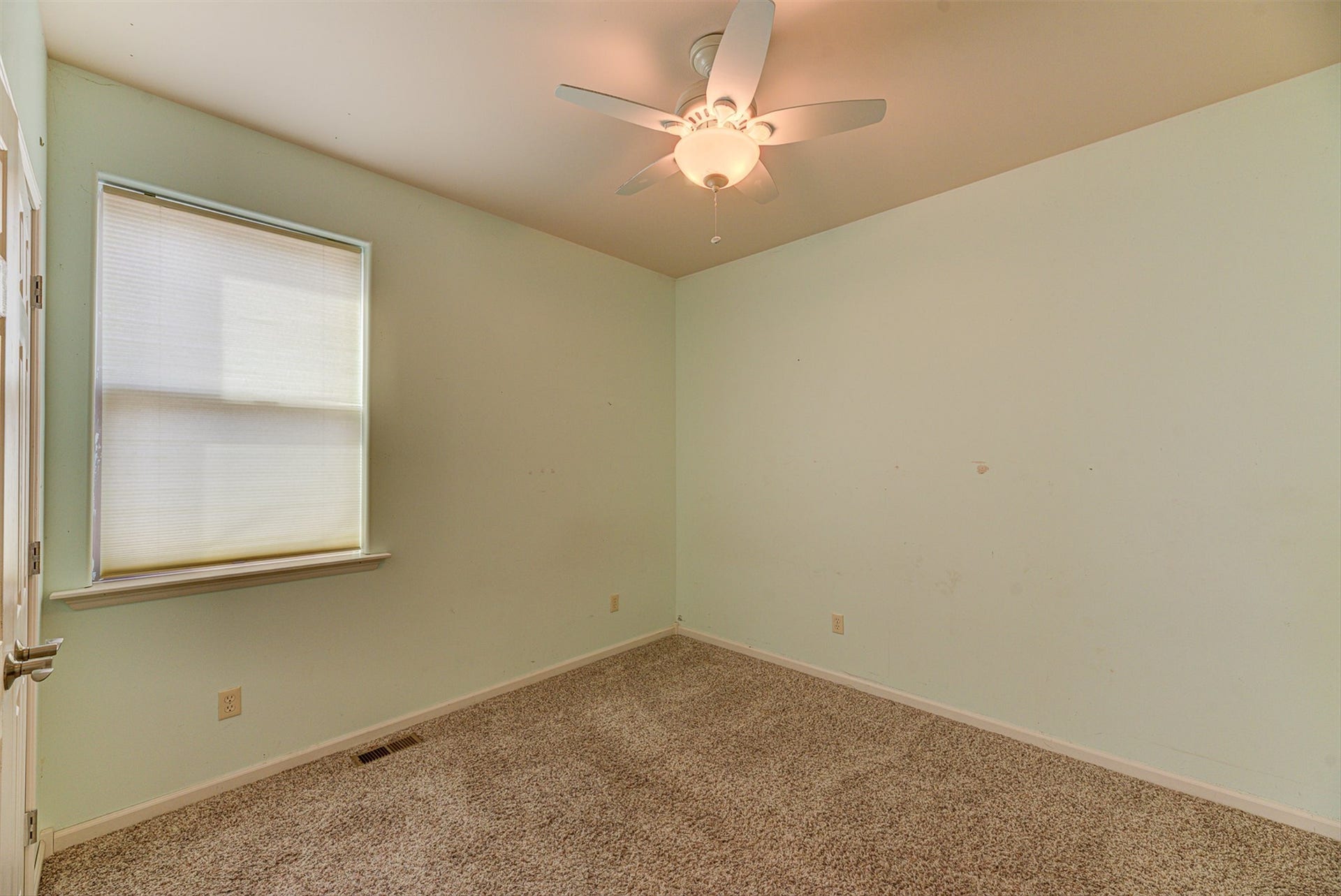 8224 Hillside Drive, Helena, MT 59602 Carpeted flooring, window with blinds, ceiling fan with integrated lighting