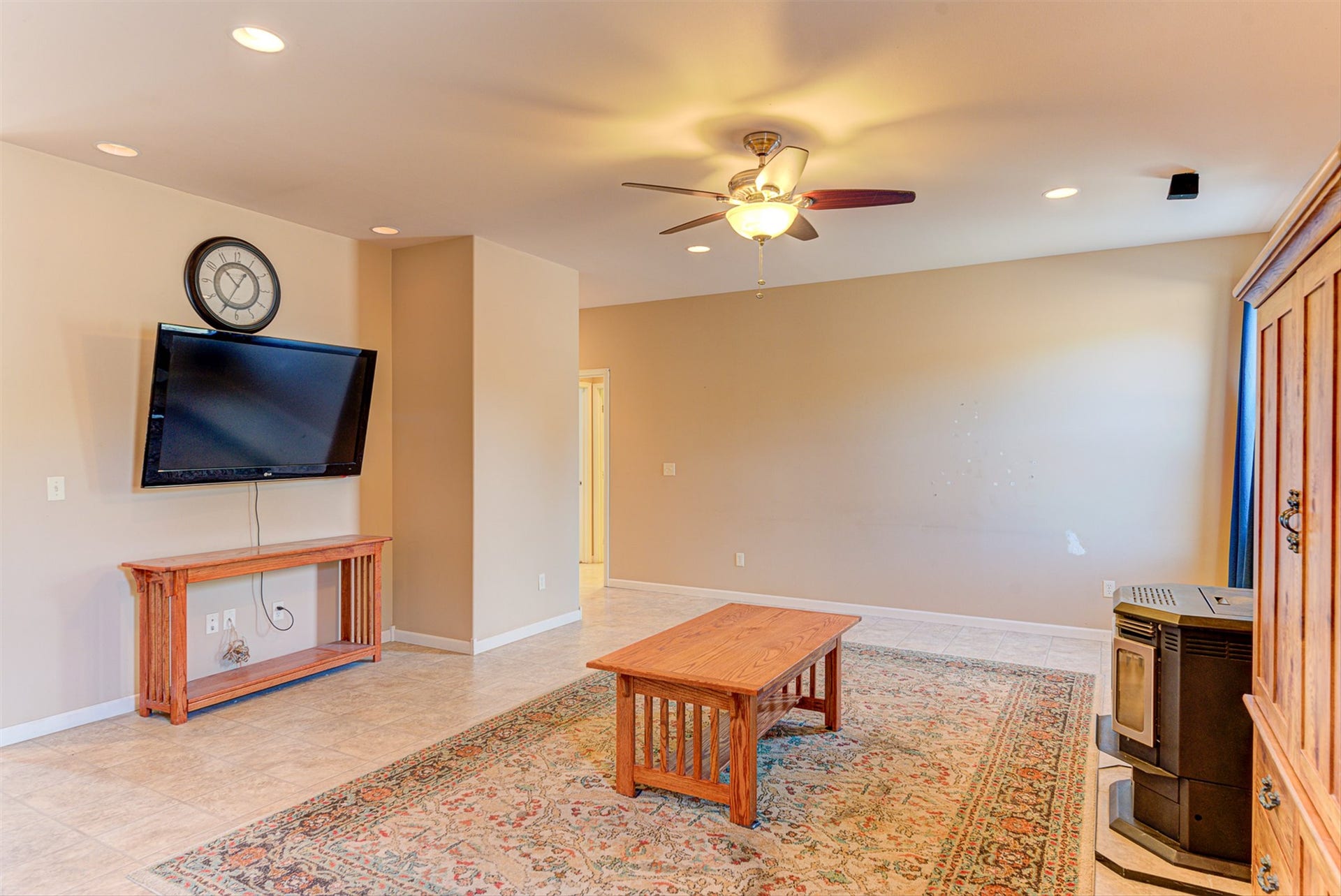 8224 Hillside Drive, Helena, MT 59602 Recessed lighting, ceiling fan, neutral wall tones, and tiled flooring