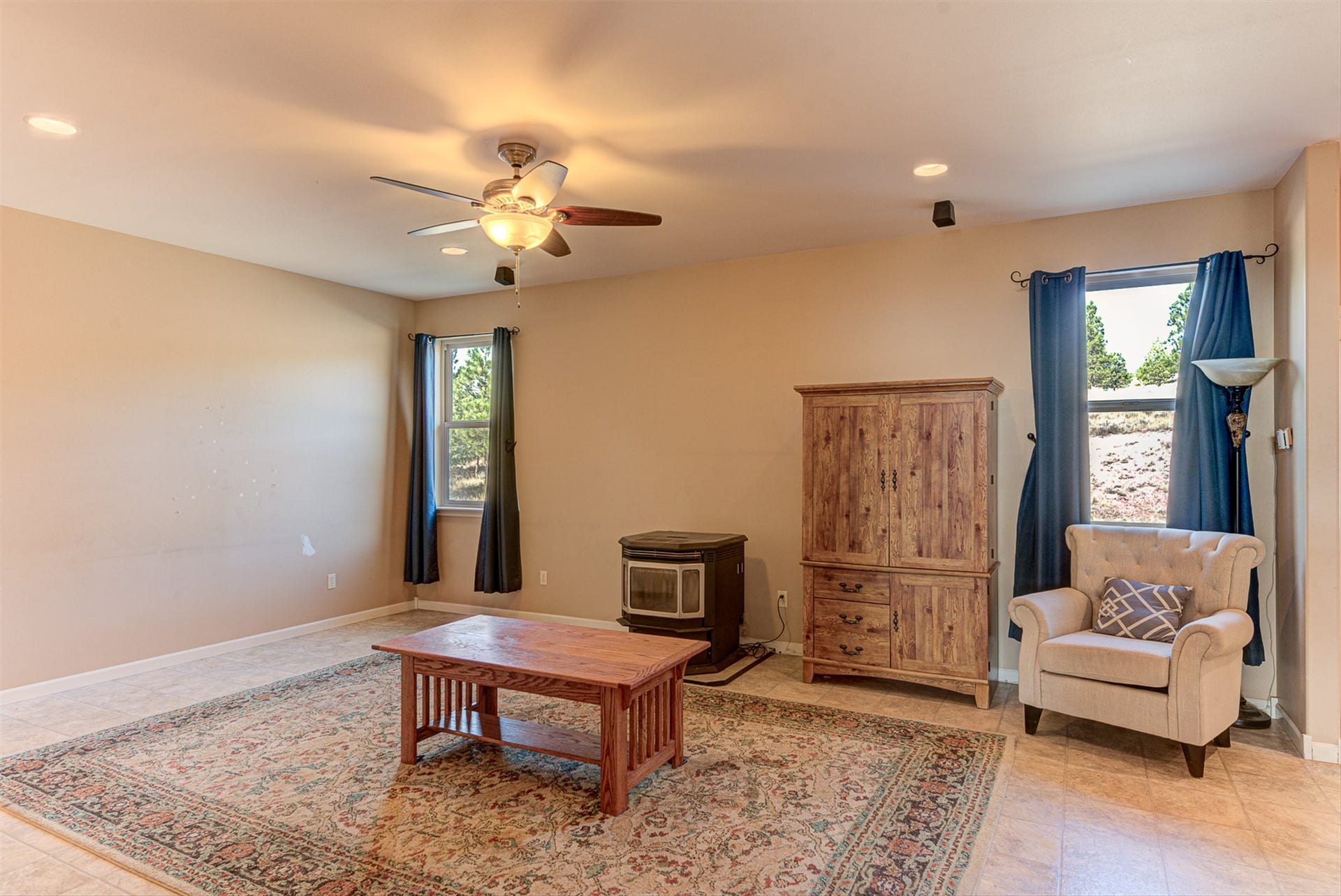 8224 Hillside Drive, Helena, MT 59602 Recessed lighting, ceiling fan light fixture, tiled flooring, built-in window, and a built-in stove