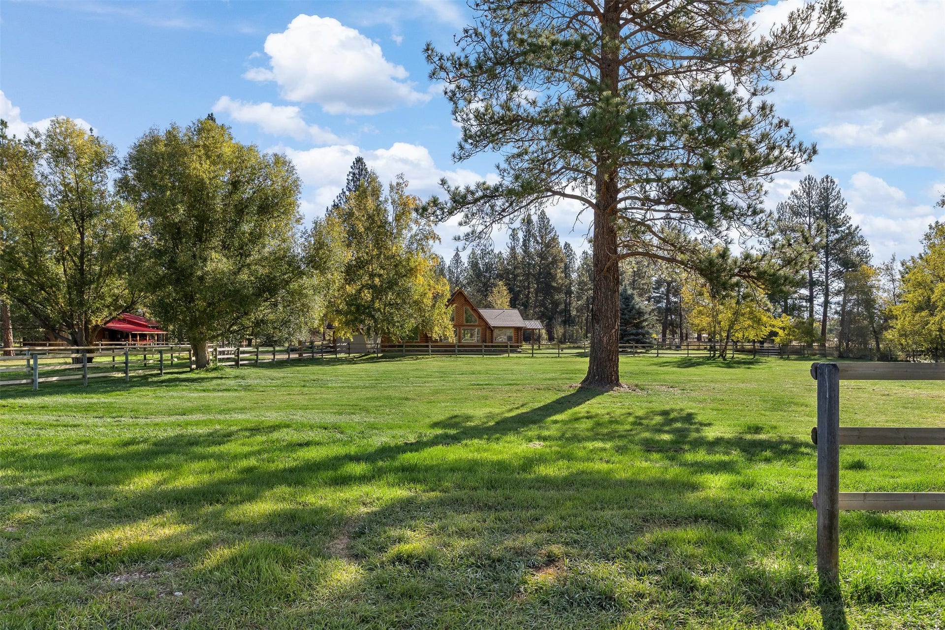 5165 Moores Way, Florence, MT 59833 Front of main log home and side view of guest house on left