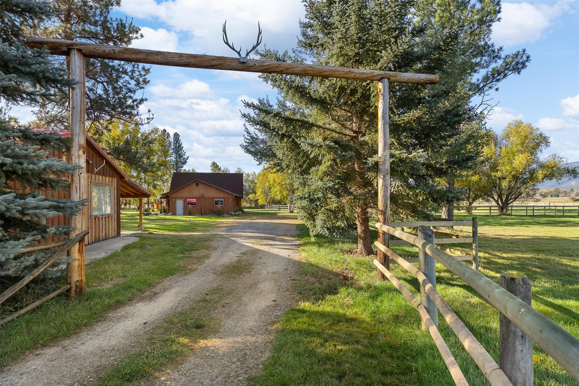 5165 Moores Way, Florence, MT 59833 Entry with guest house on left and main home straight ahead