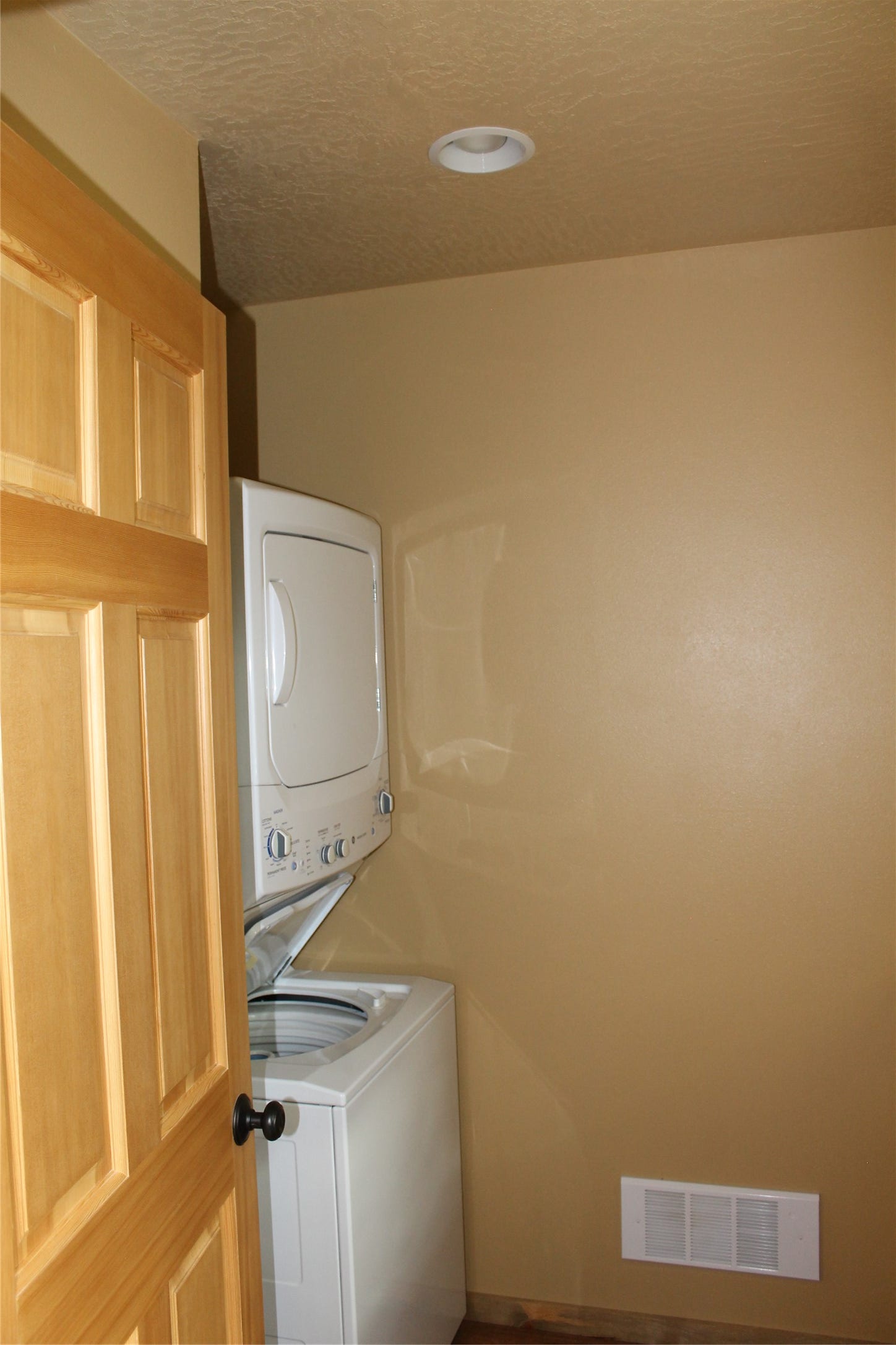 1/2 Bath with Stack Washer/Dryer & Storage Closet